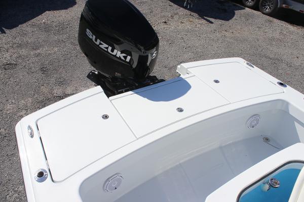 2025 East Cape 25 Open boat with Suzuki outboard motor, rear deck view.