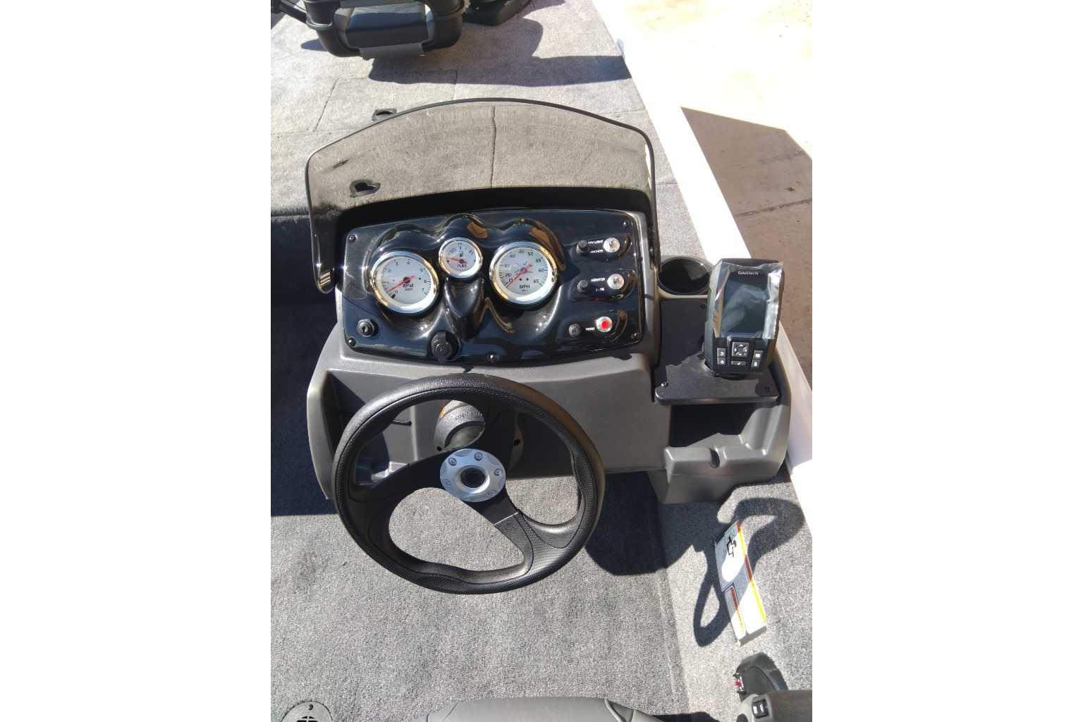 2026 Tracker Pro 170 boat dashboard with steering wheel and gauges.