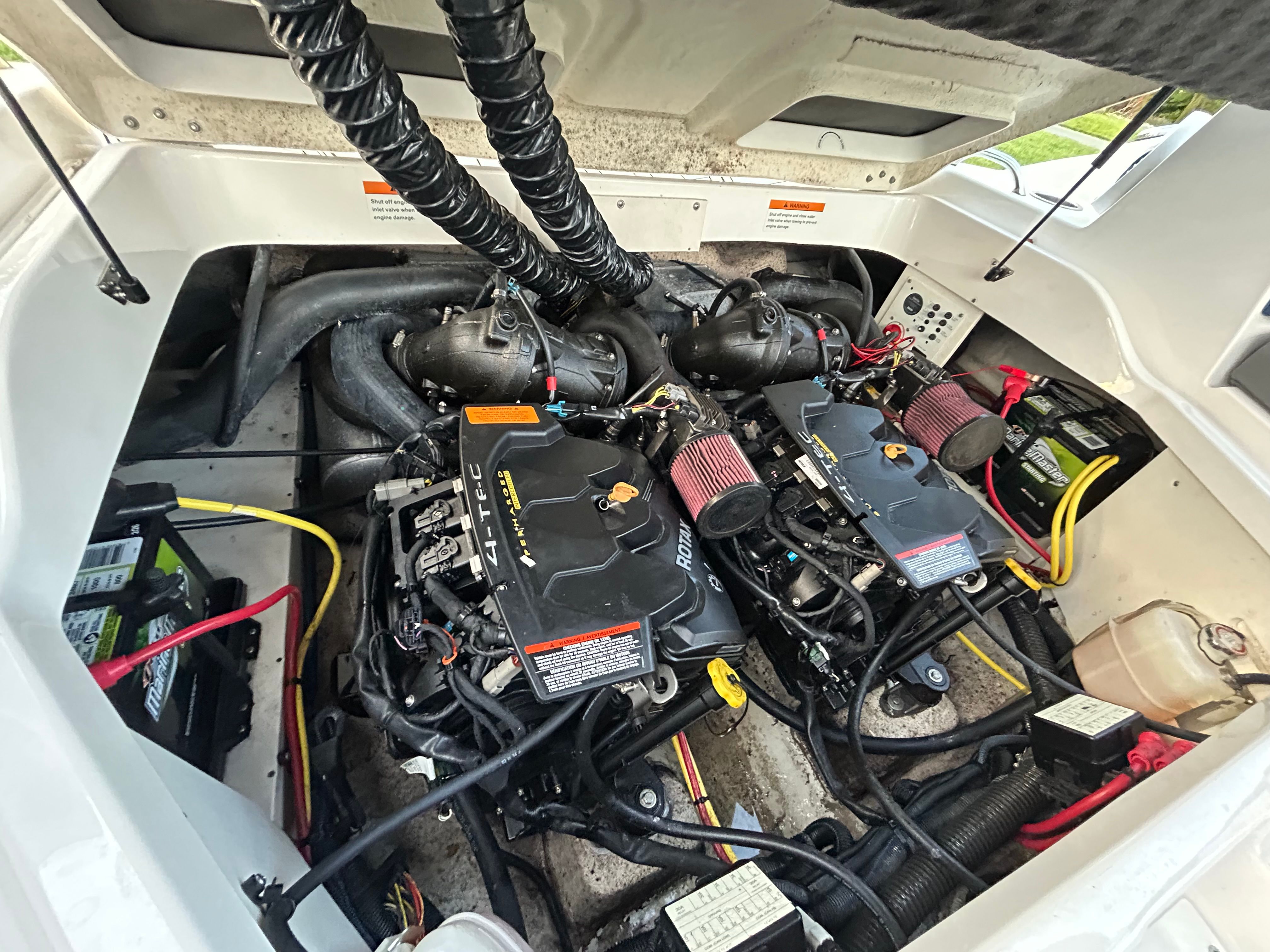 Engine compartment of 2015 Chaparral Vortex 243 VRX with dual engines.