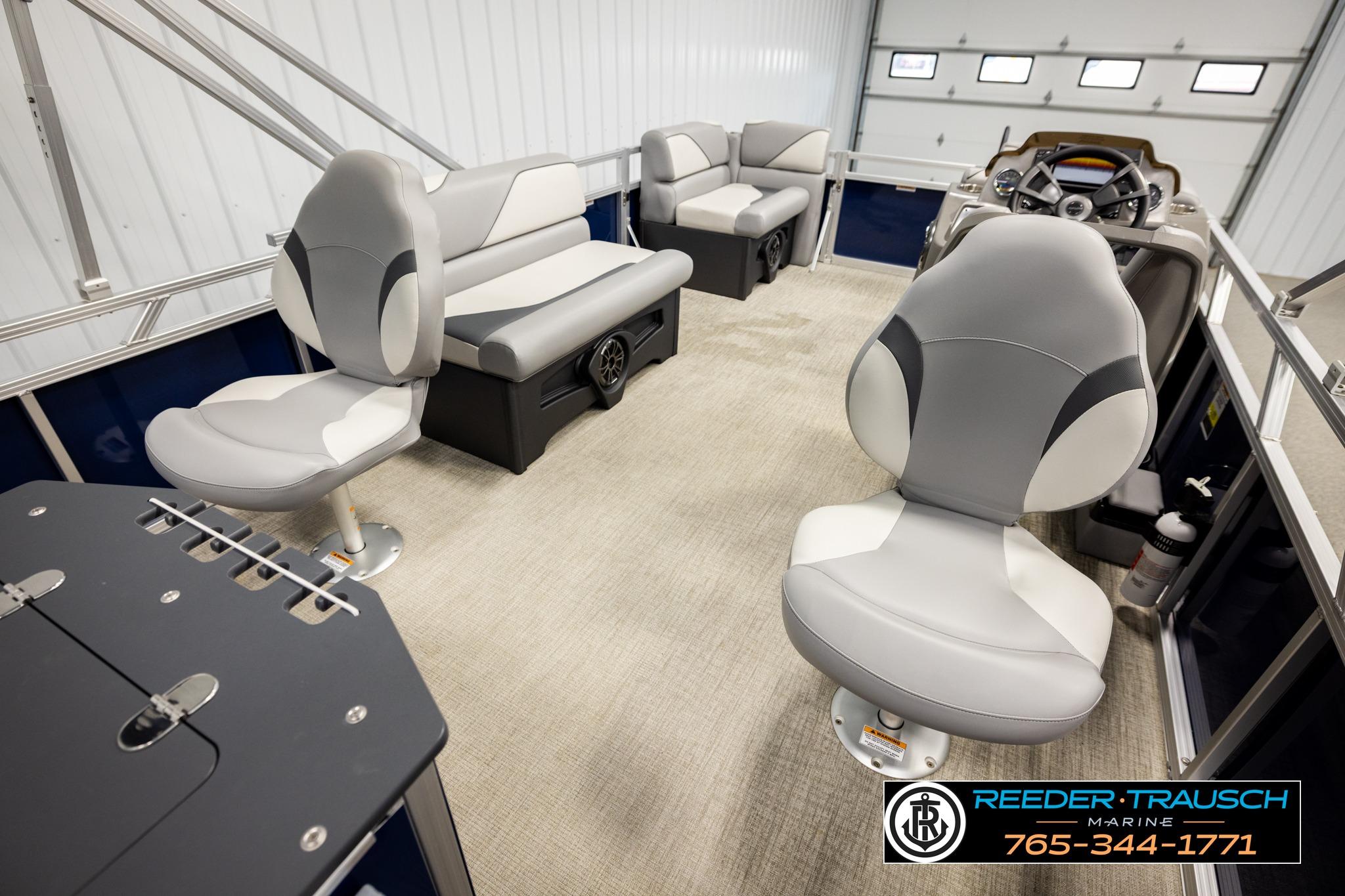 Interior of 2025 Avalon VEN RF boat with modern seating and steering console.