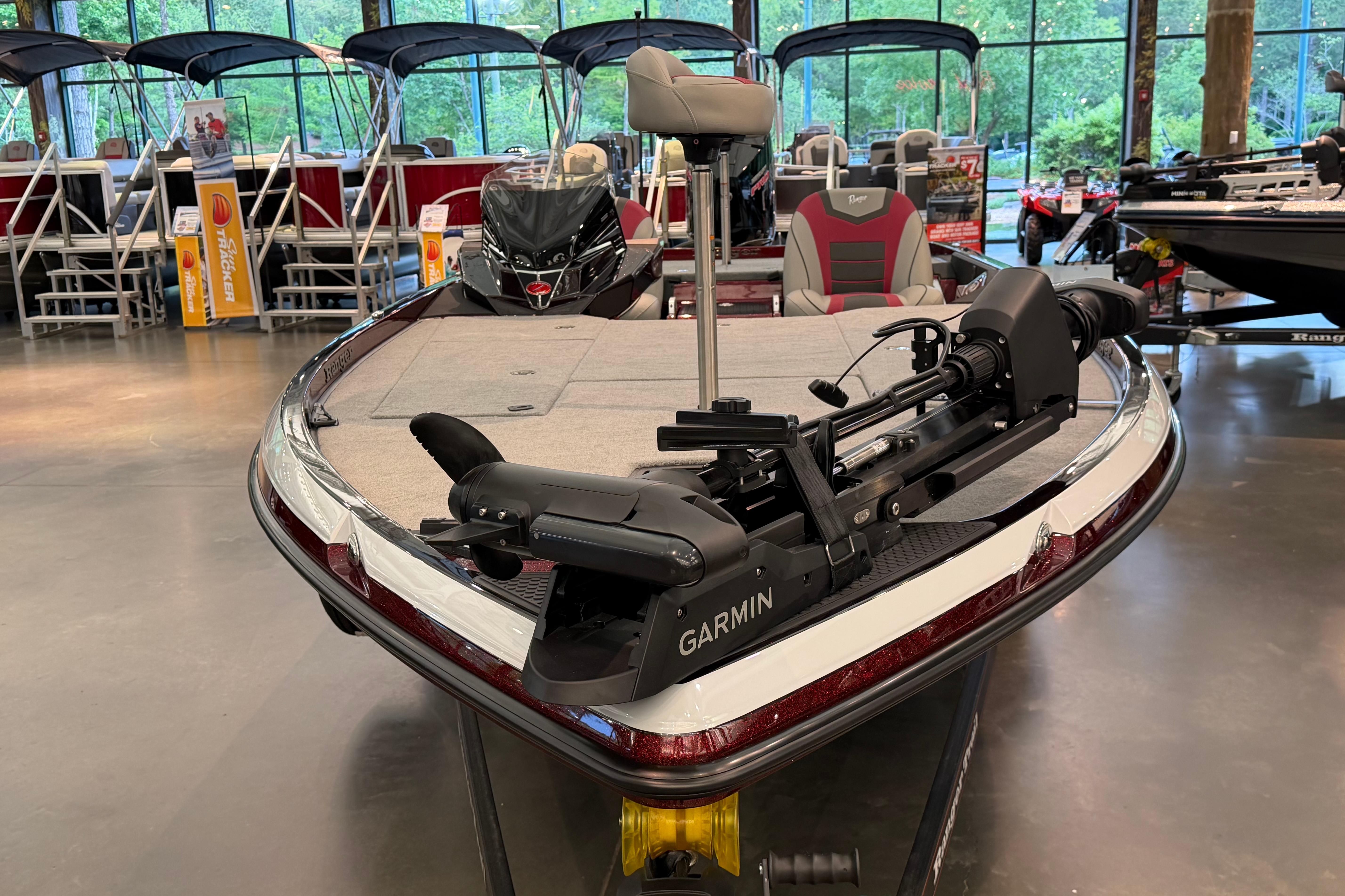2026 Ranger Z521 boat with Garmin equipment displayed in a showroom.