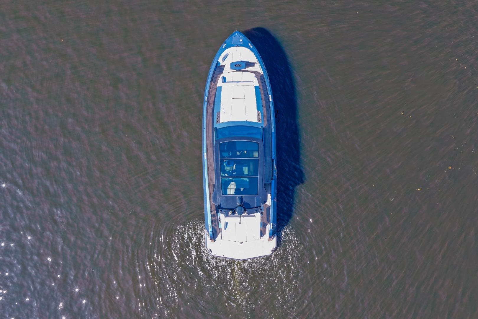 Aerial view of 2022 Vanquish Yachts VQ45 on calm water.