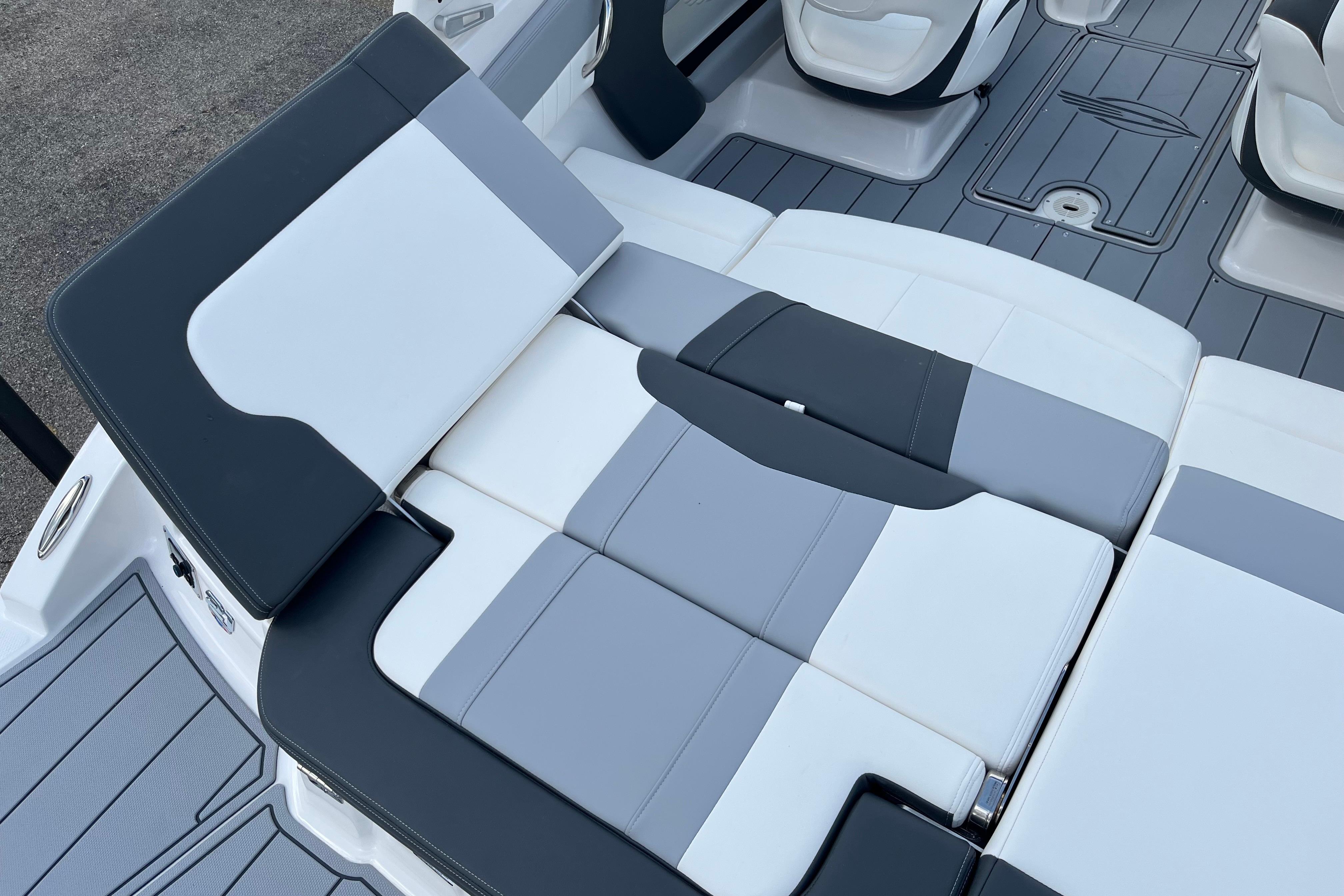 2026 Chaparral 21 SSi boat interior with gray and white seating.