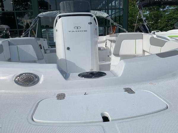 2024 Tahoe 2150 CC boat interior with seating and storage compartments.