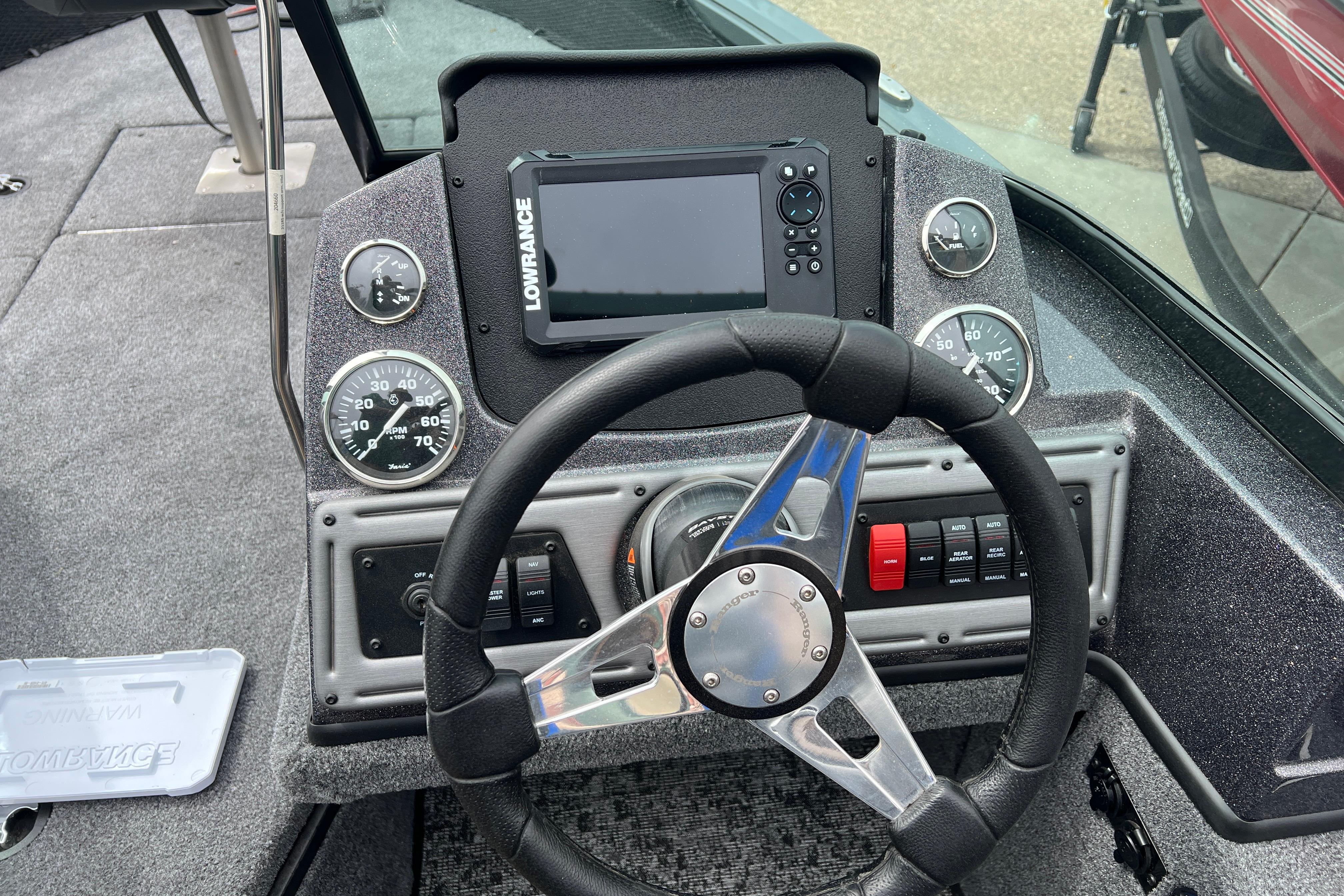 2026 Ranger VS1682SC Angler boat dashboard with steering wheel and Lowrance display.