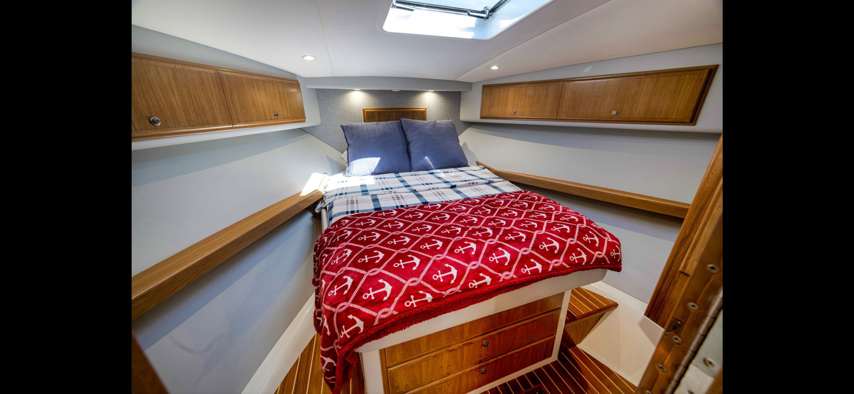 Interior of 2022 Mag Bay 42 Express with cozy bed.