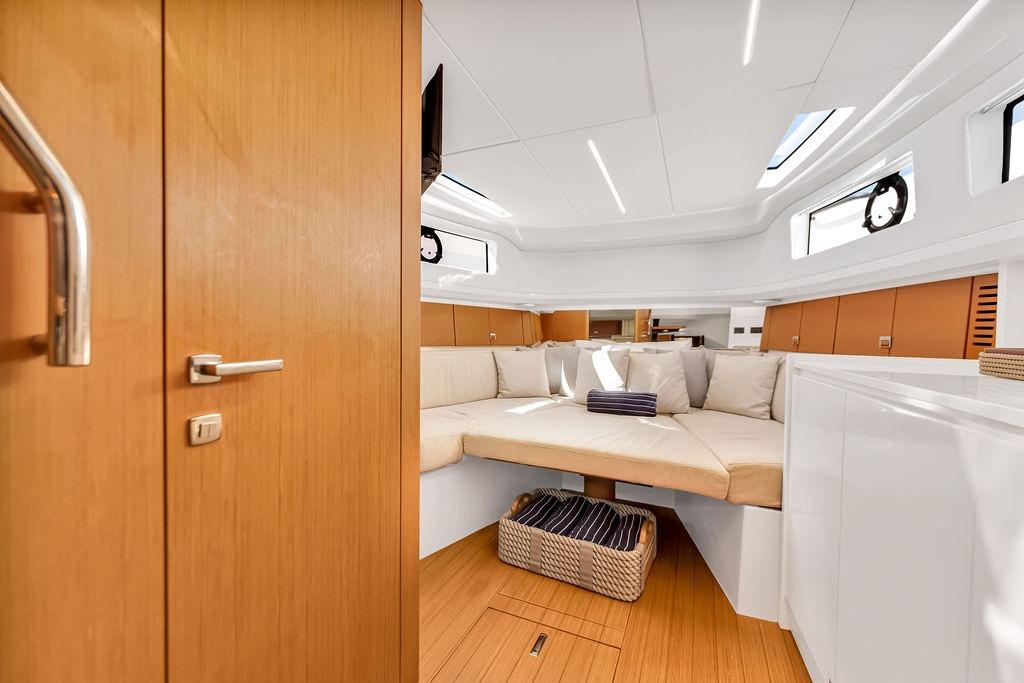 Luxurious interior of 2021 Bluegame BG 42 yacht with cozy seating and modern design.
