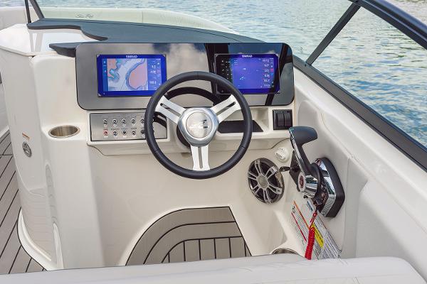 Manufacturer Provided Image: 2025 Sea Ray SDX 250 helm with dual navigation screens and modern controls.