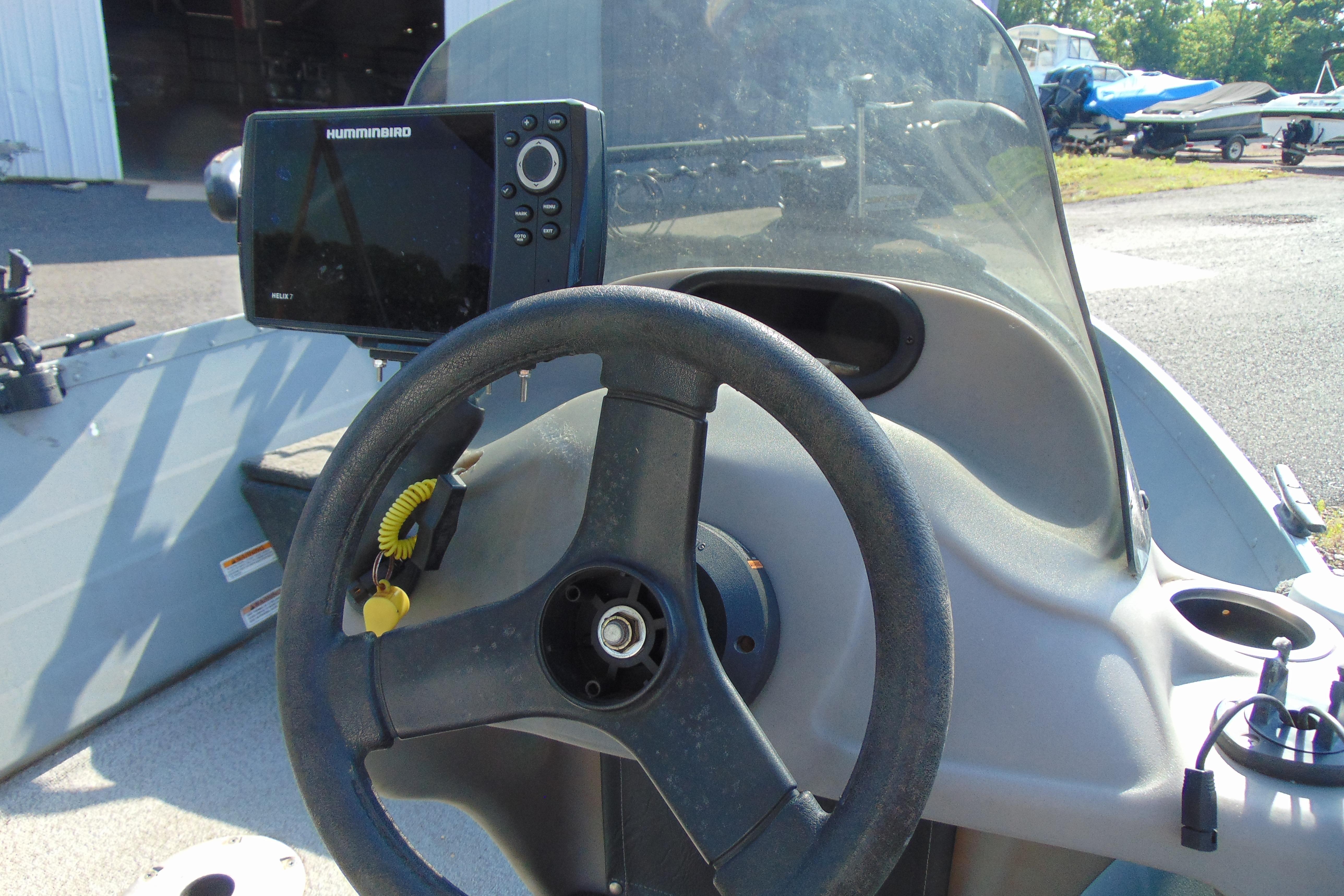 Steering console of 2017 Starcraft SF 16 DLX boat with Humminbird fish finder.