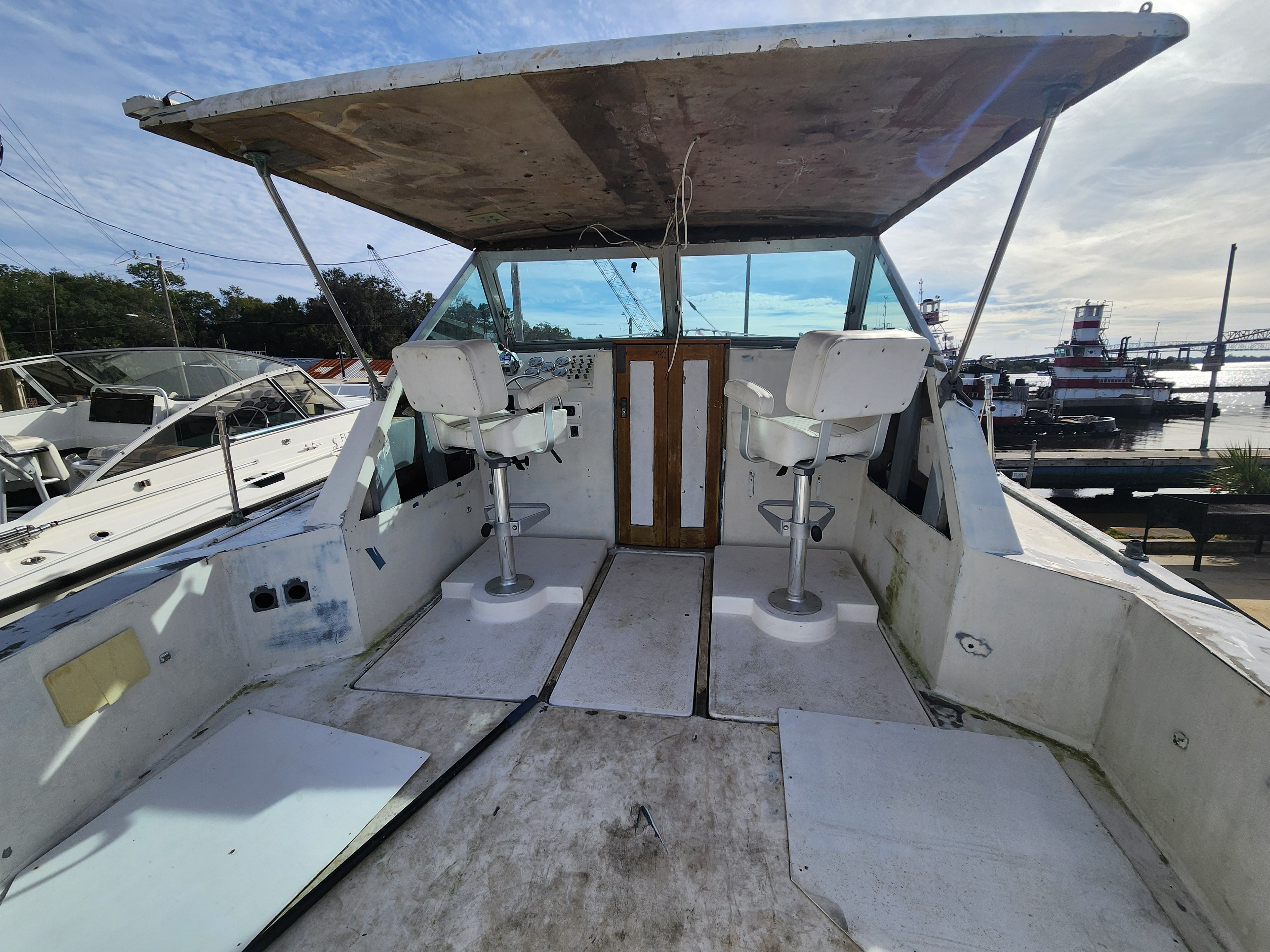 Interior view of a 1967 Hatteras 28ft boat with two seats.