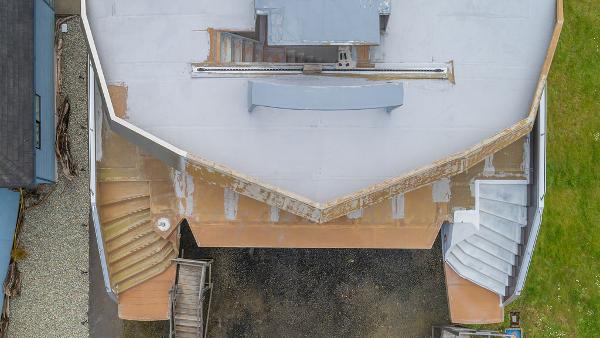 Aerial view of a 2025 Catamaran Bloomfield 86 Motorsailor under construction, showcasing deck layout.