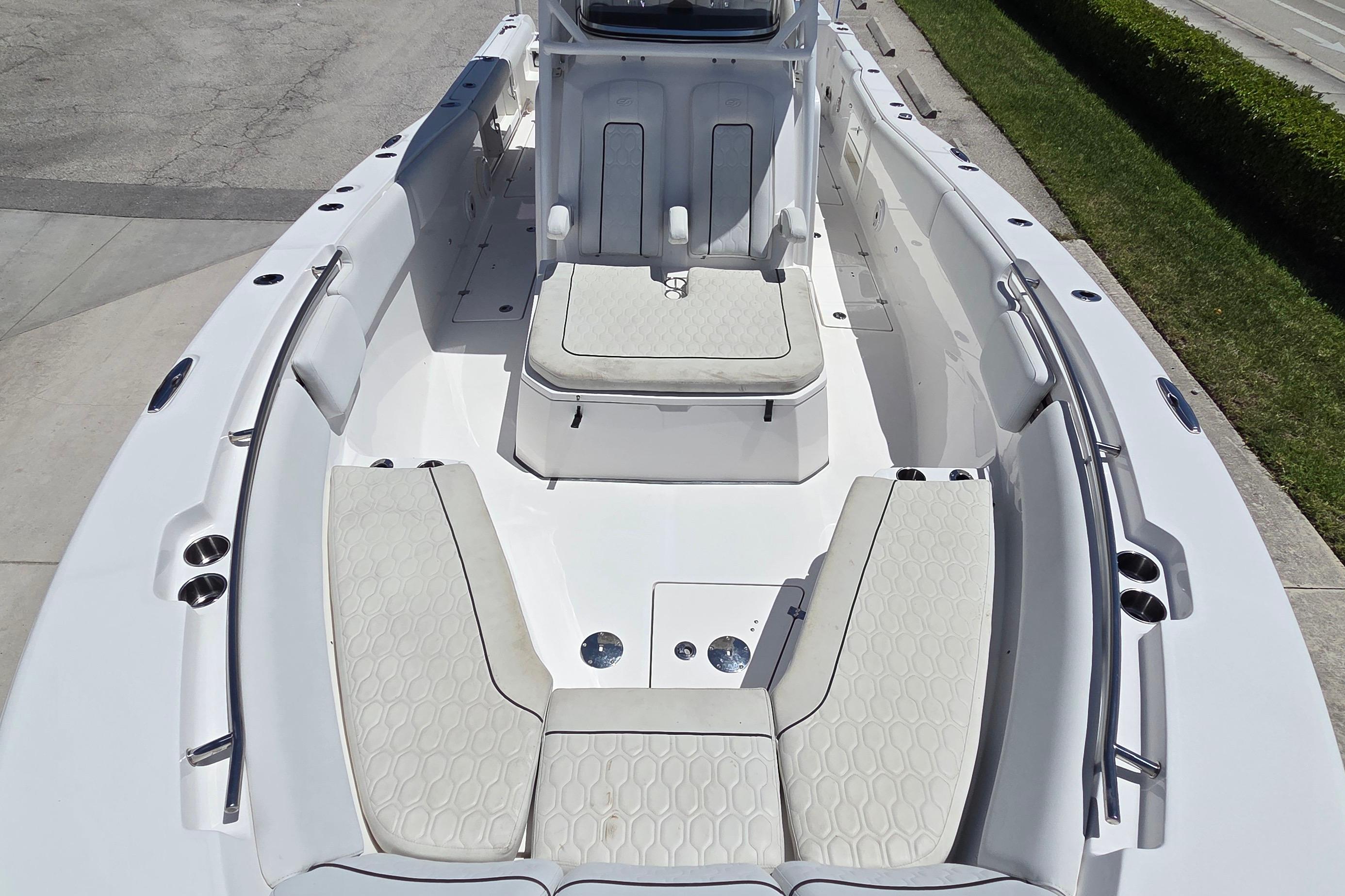 2021 Sea Fox 328 Commander boat interior with cushioned seating and sleek design.