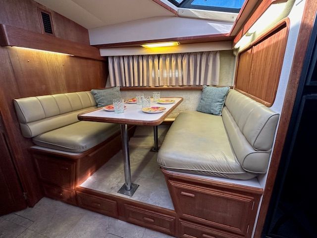 Interior of 1988 Carver 3807 Yacht with dining area.