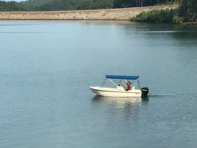Mako 171 Center Console 2006 boat on calm water.