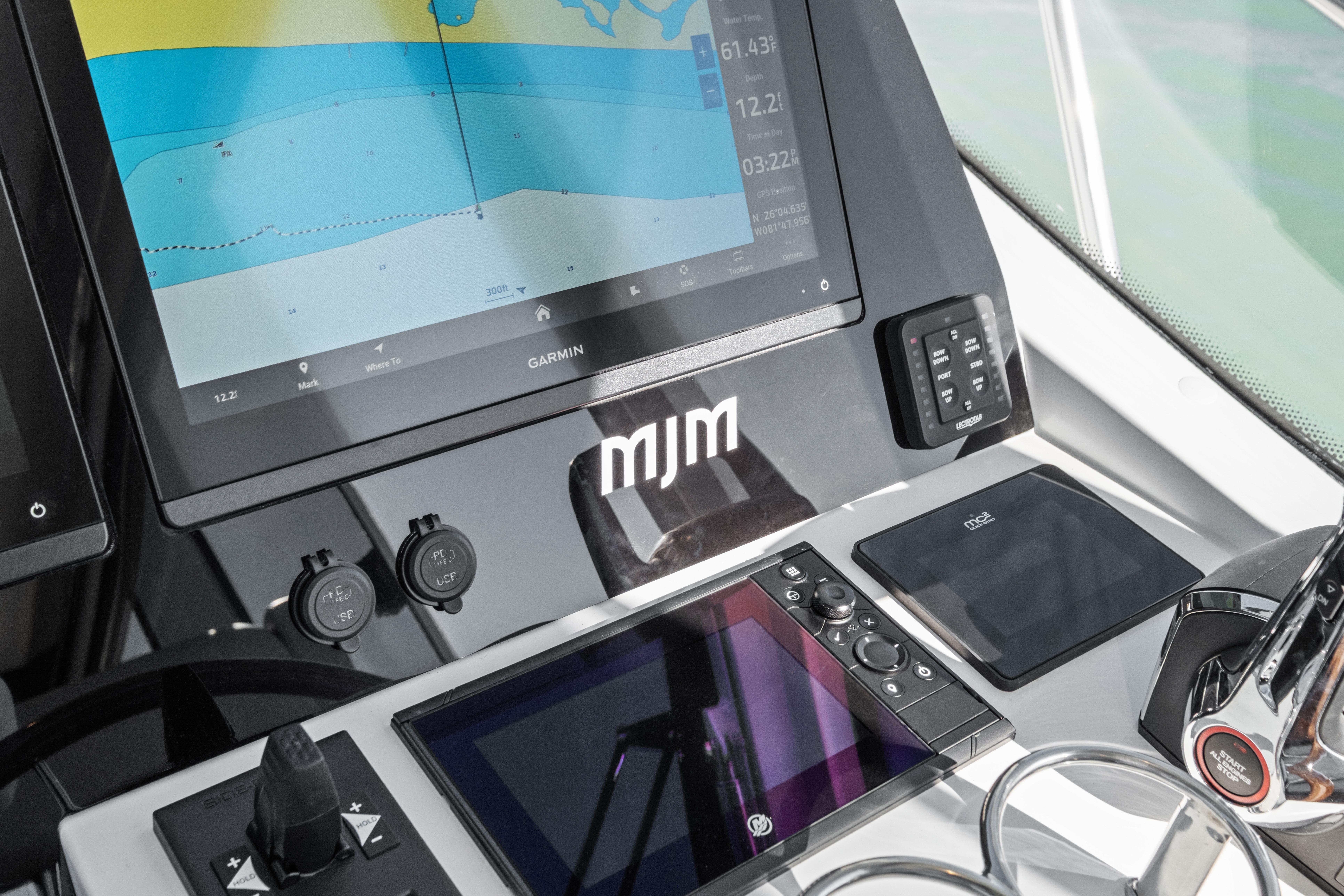 Cockpit of 2026 MJM 47 R yacht with advanced navigation displays.