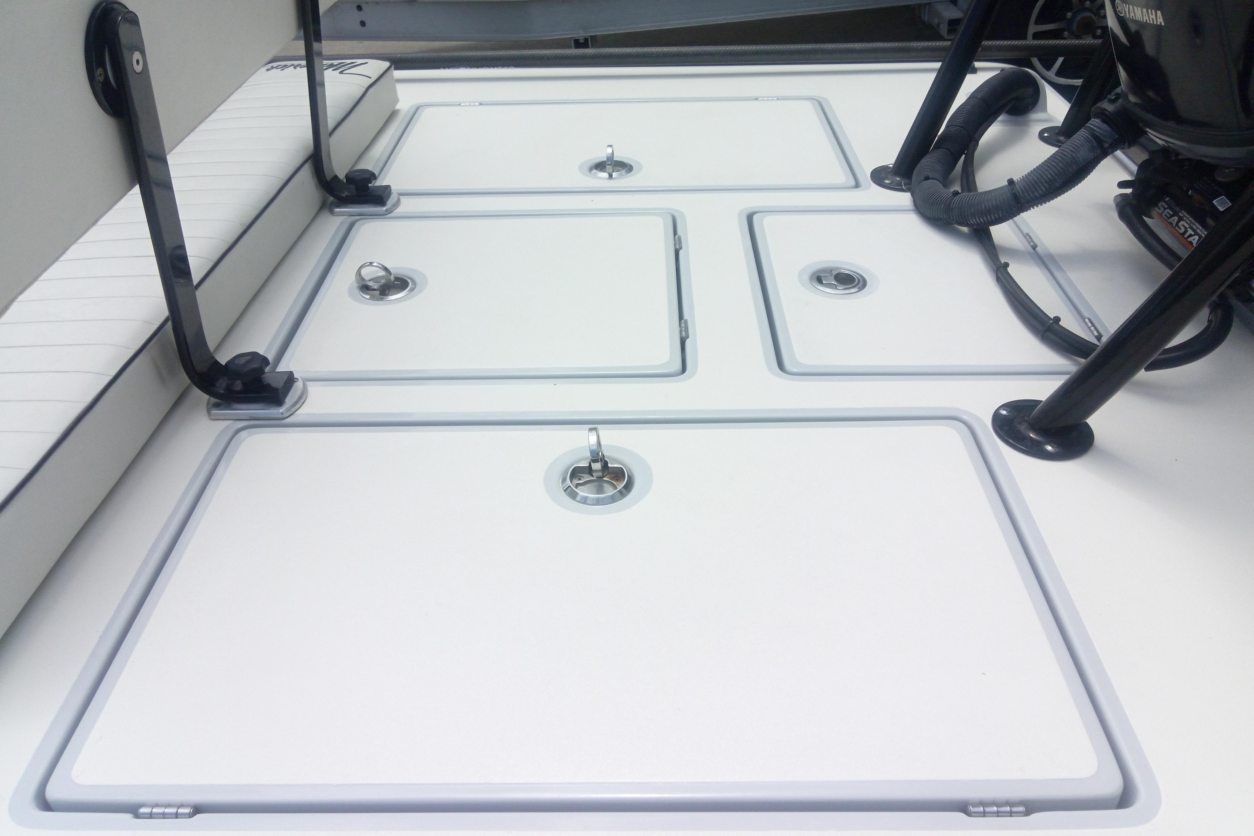2020 Maverick 18 HPX-V boat deck with storage compartments and Yamaha engine.