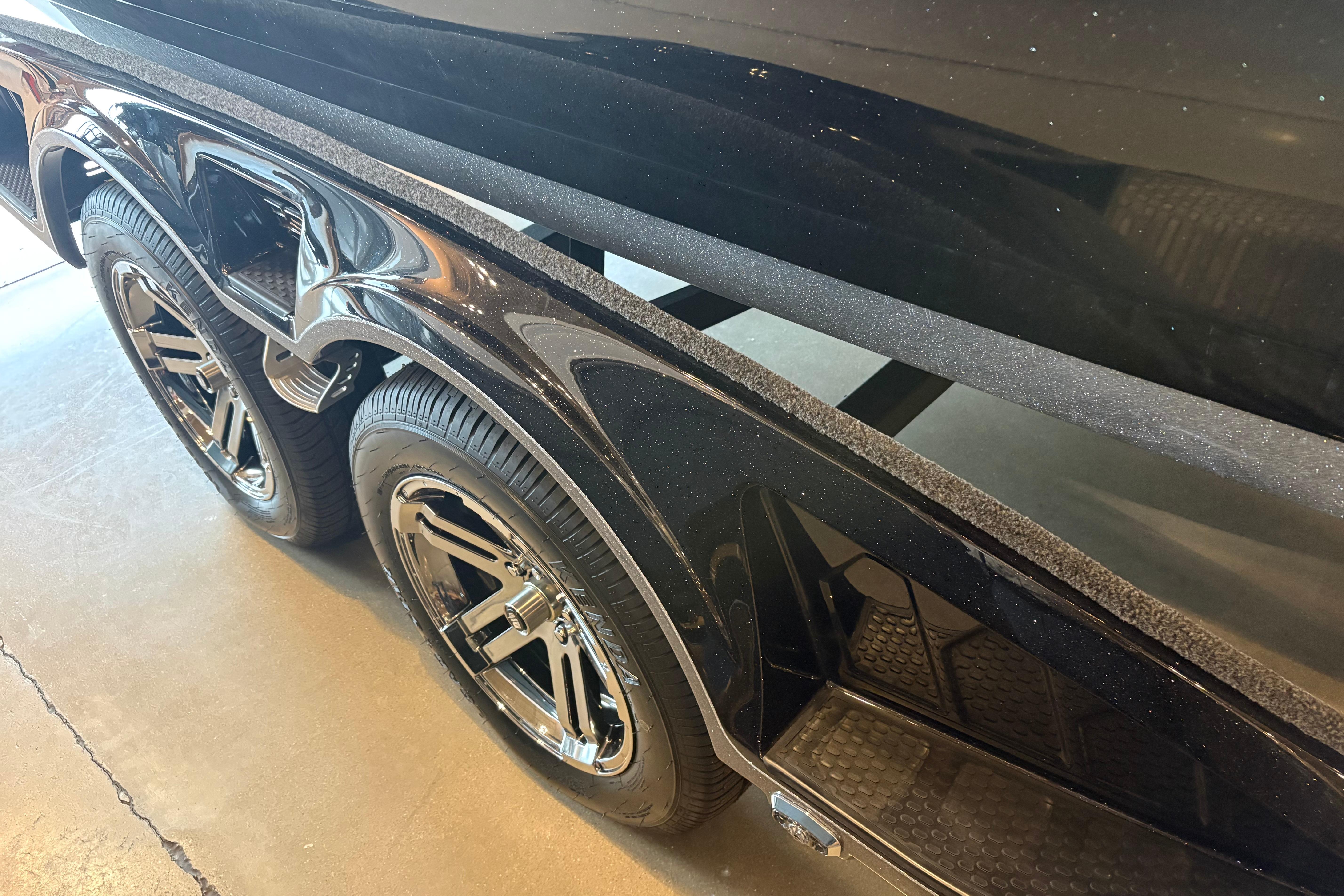 2026 Ranger 621FS Cup-Equipped trailer with shiny black wheels and sleek design.