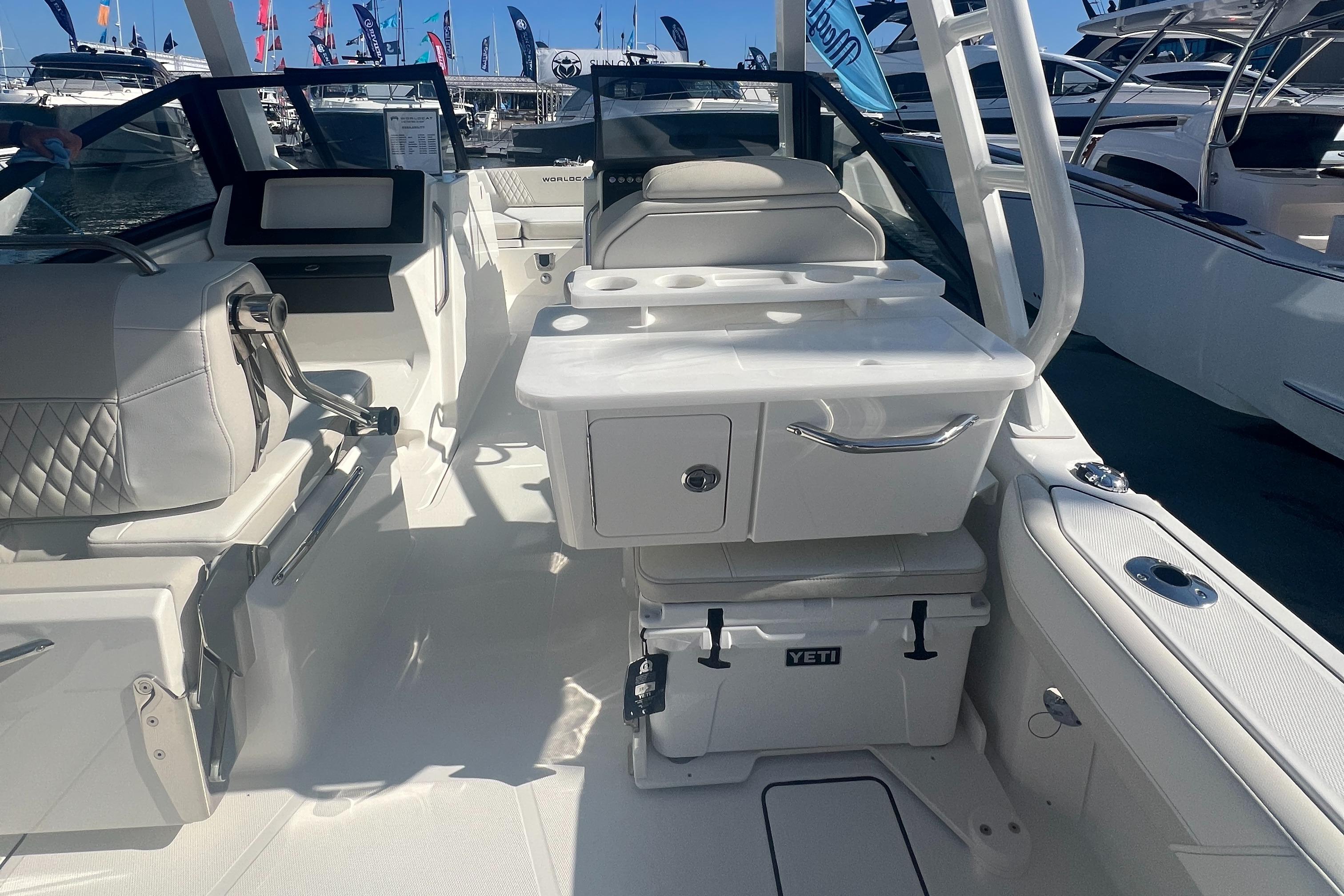 2024 World Cat 260 DC-X interior with seating, storage, and Yeti cooler.