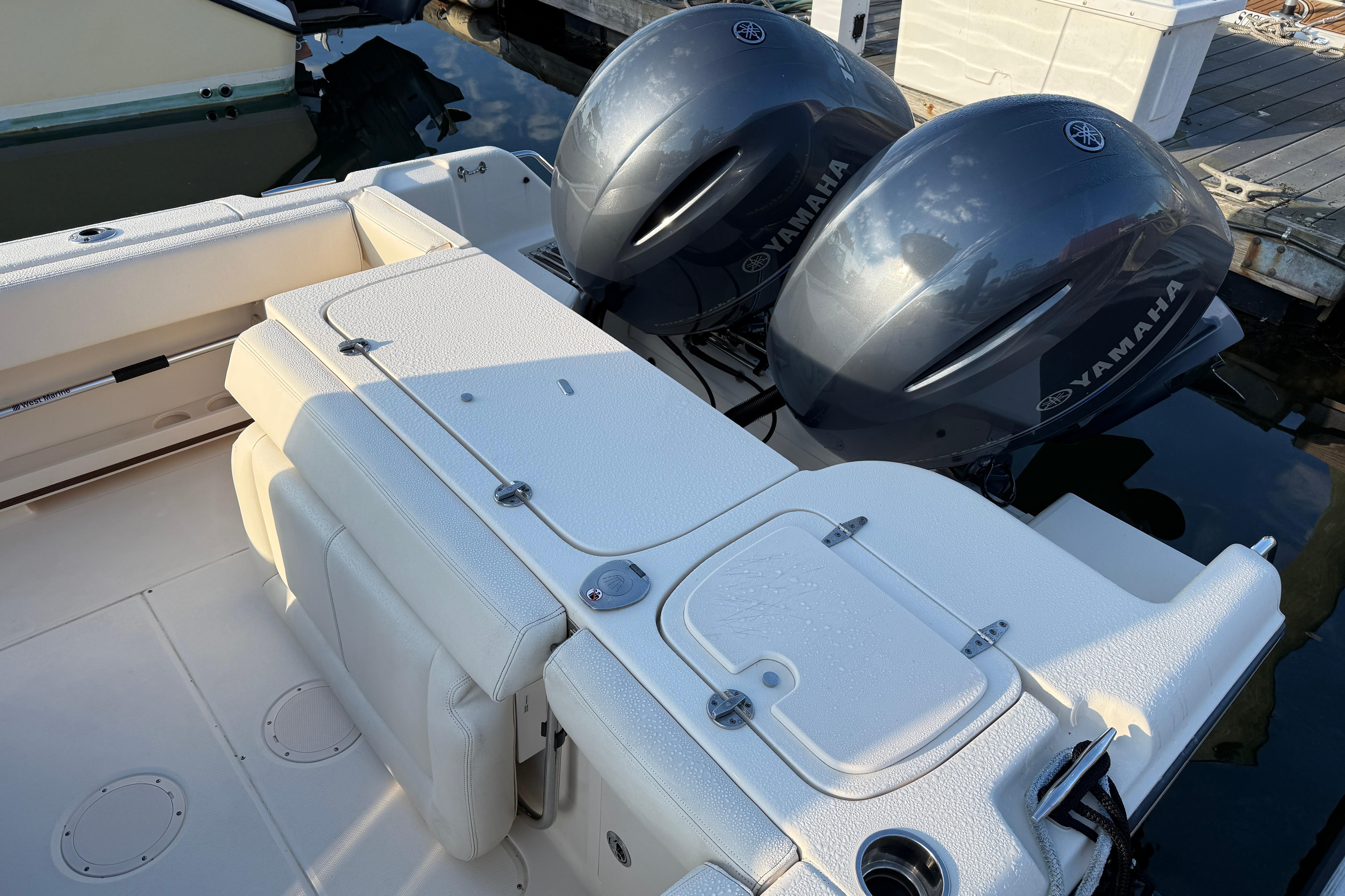 2017 Grady White 257 Fisherman boat with dual Yamaha engines at dock.