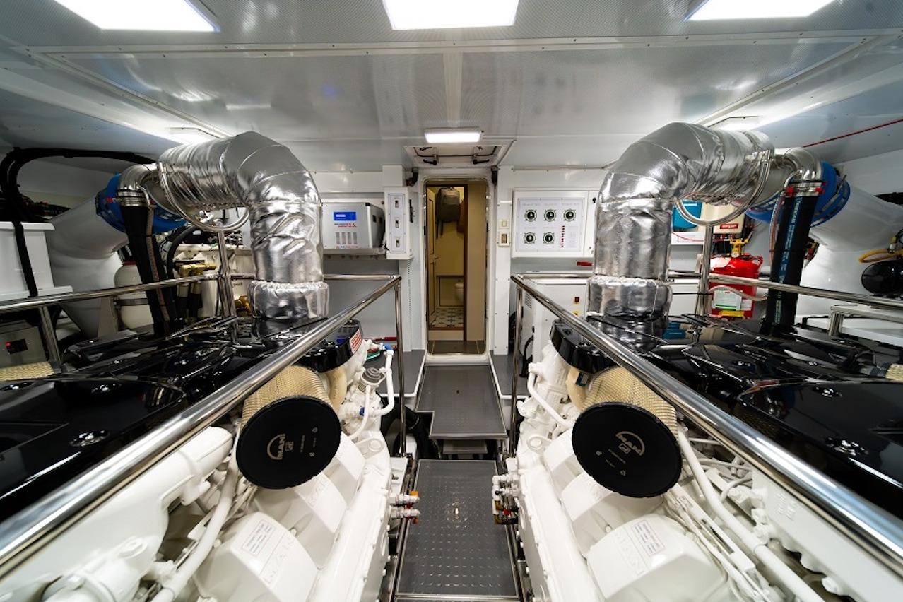 Engine room of 2027 Offshore Yachts 70 CE, featuring advanced machinery and sleek design.