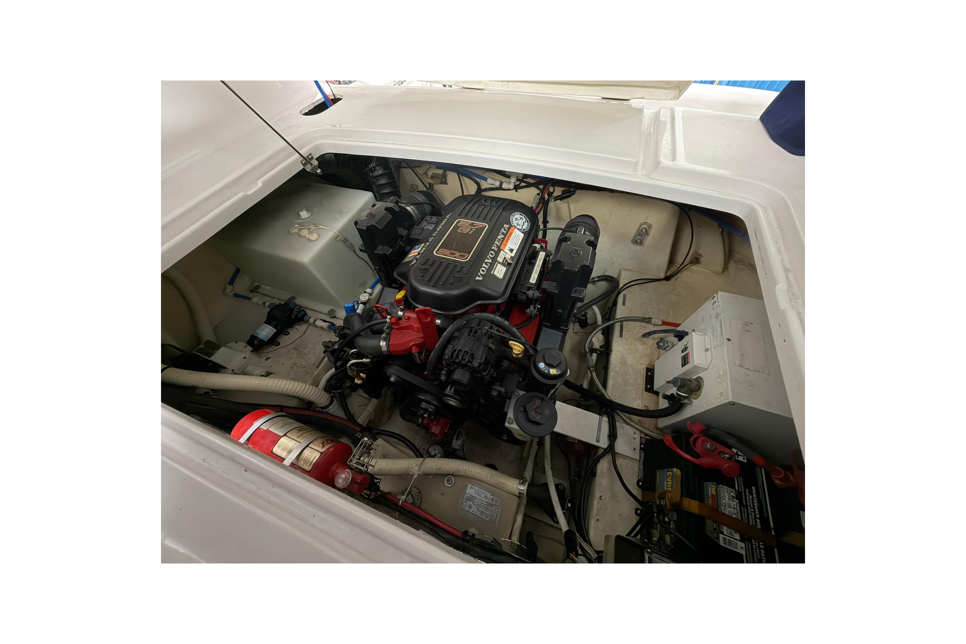 Engine compartment of a 2008 Four Winns V248 boat, featuring a Volvo Penta engine.