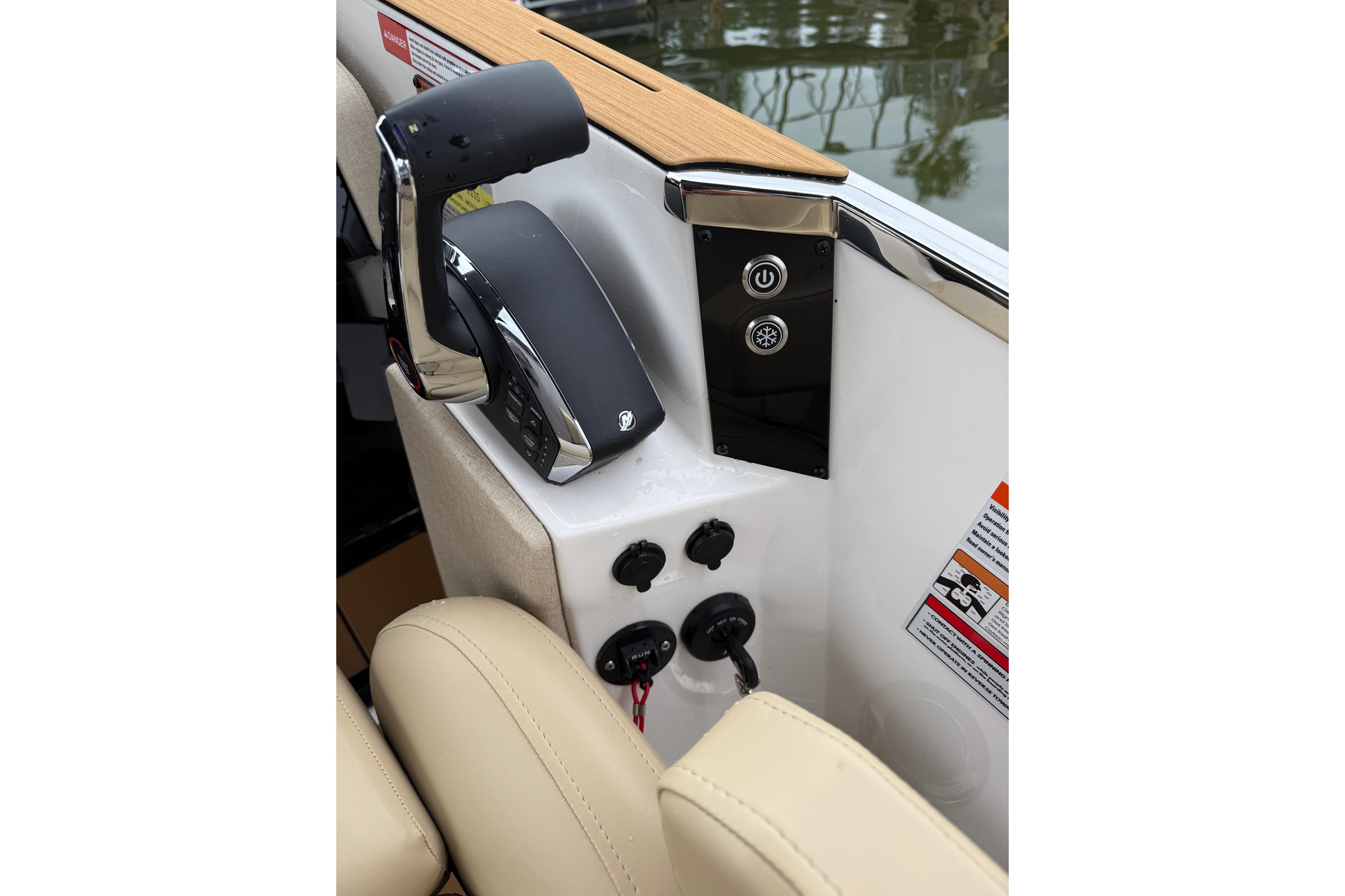Control panel of 2025 Balise Helix 26 L boat with throttle and switches.