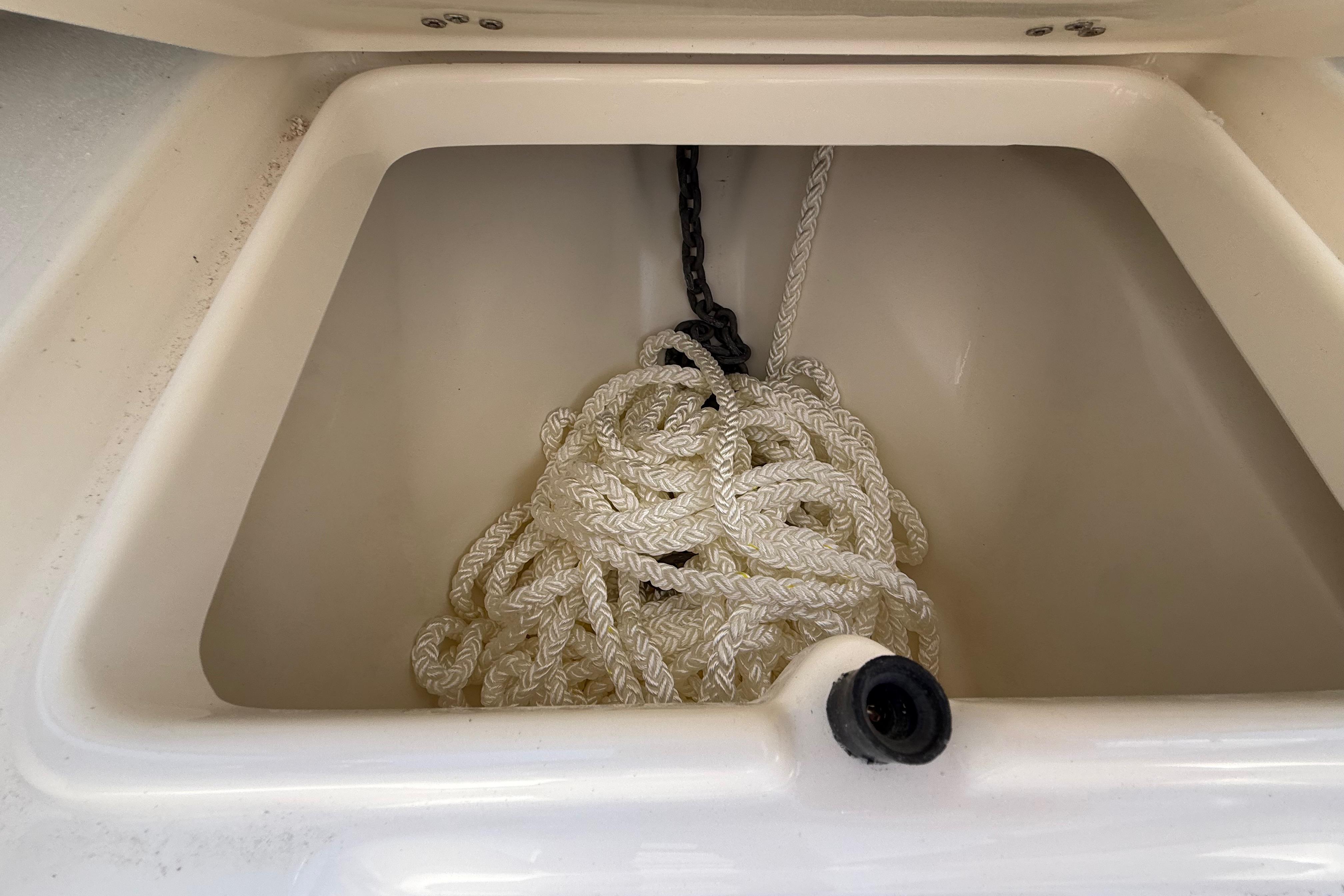 Anchor rope storage in 2027 Key West 249 FS boat compartment.