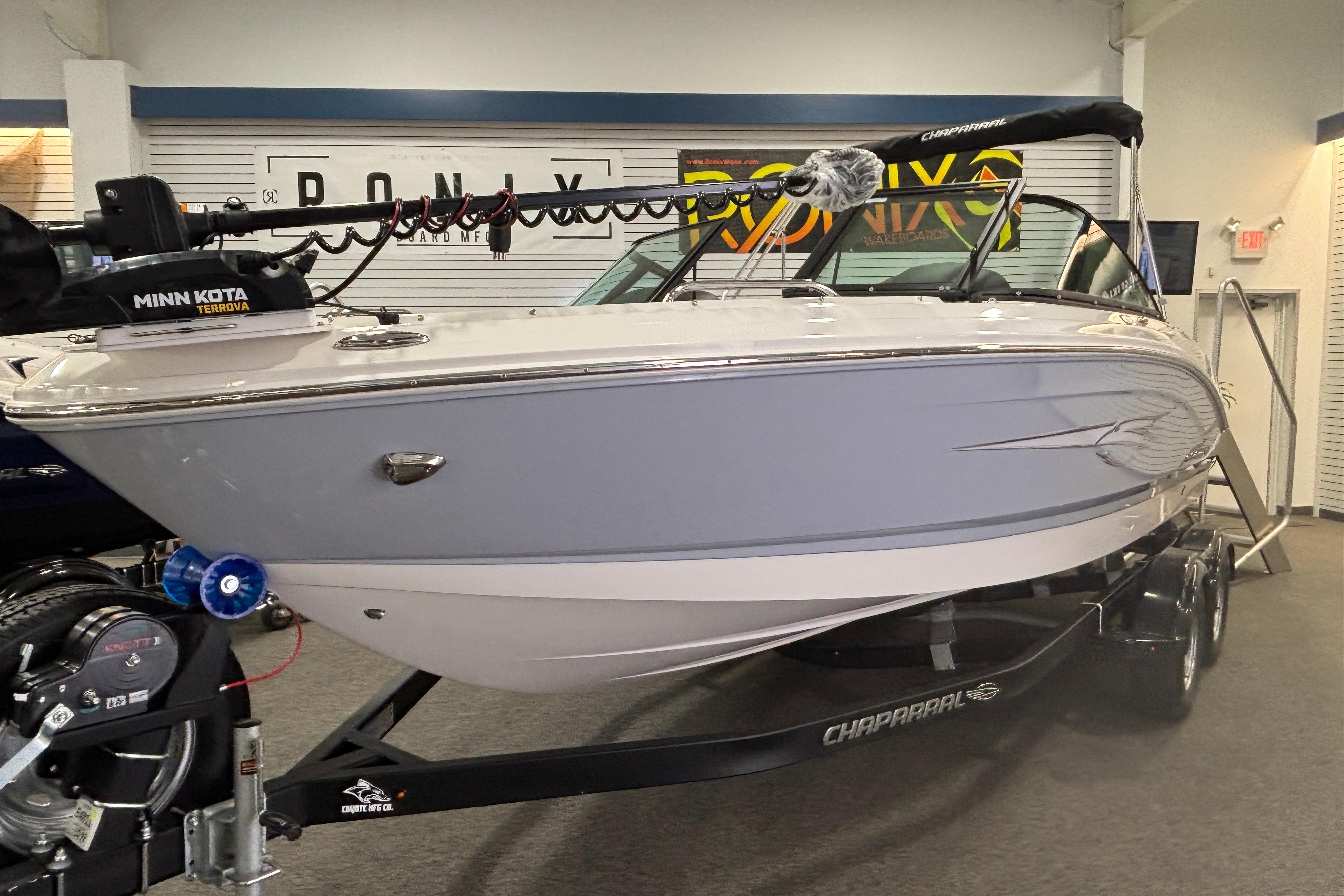 2026 Chaparral 21 SSi Ski & Fish boat in showroom.