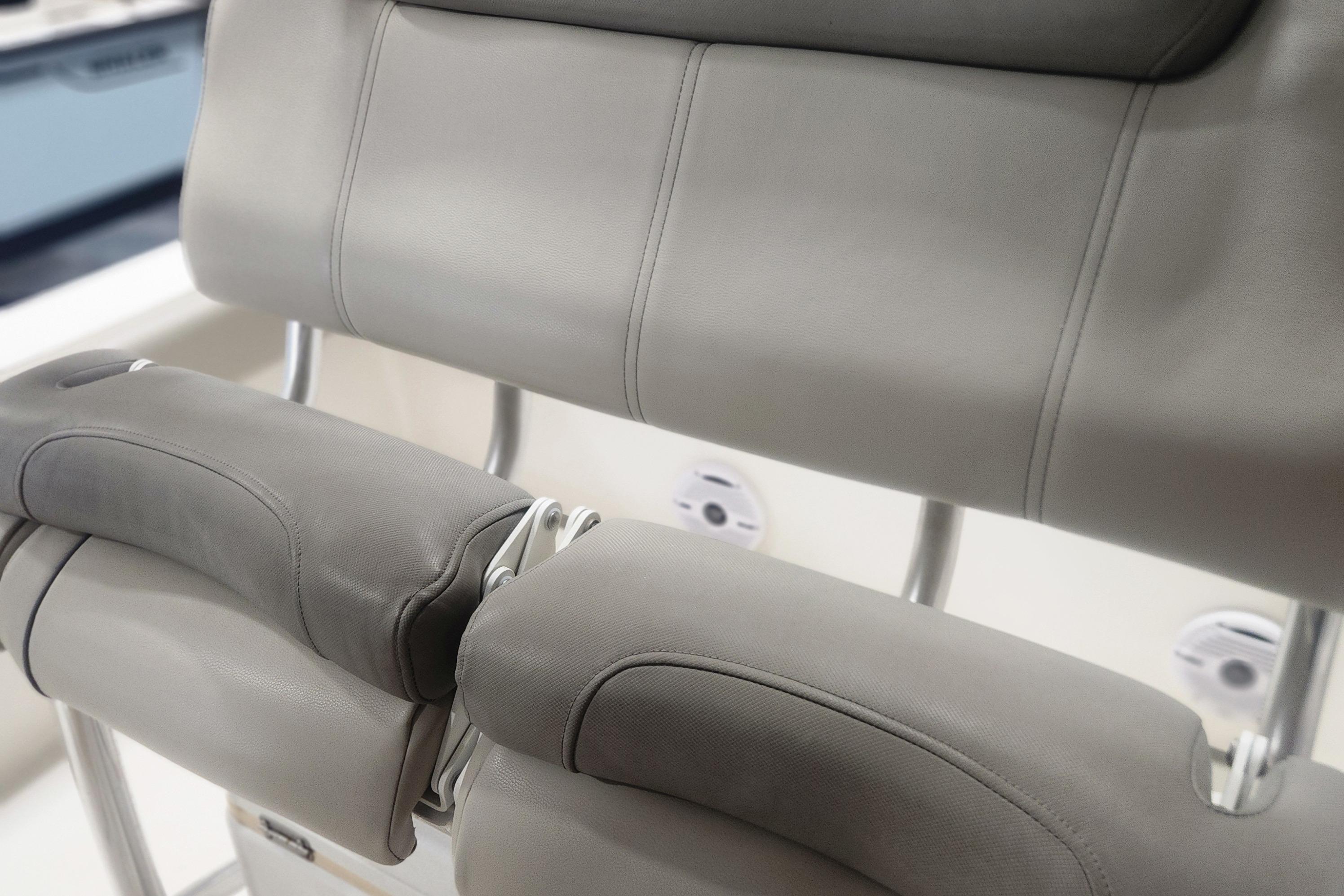 2023 Key West 219 FS boat seat with gray upholstery and stainless steel frame.