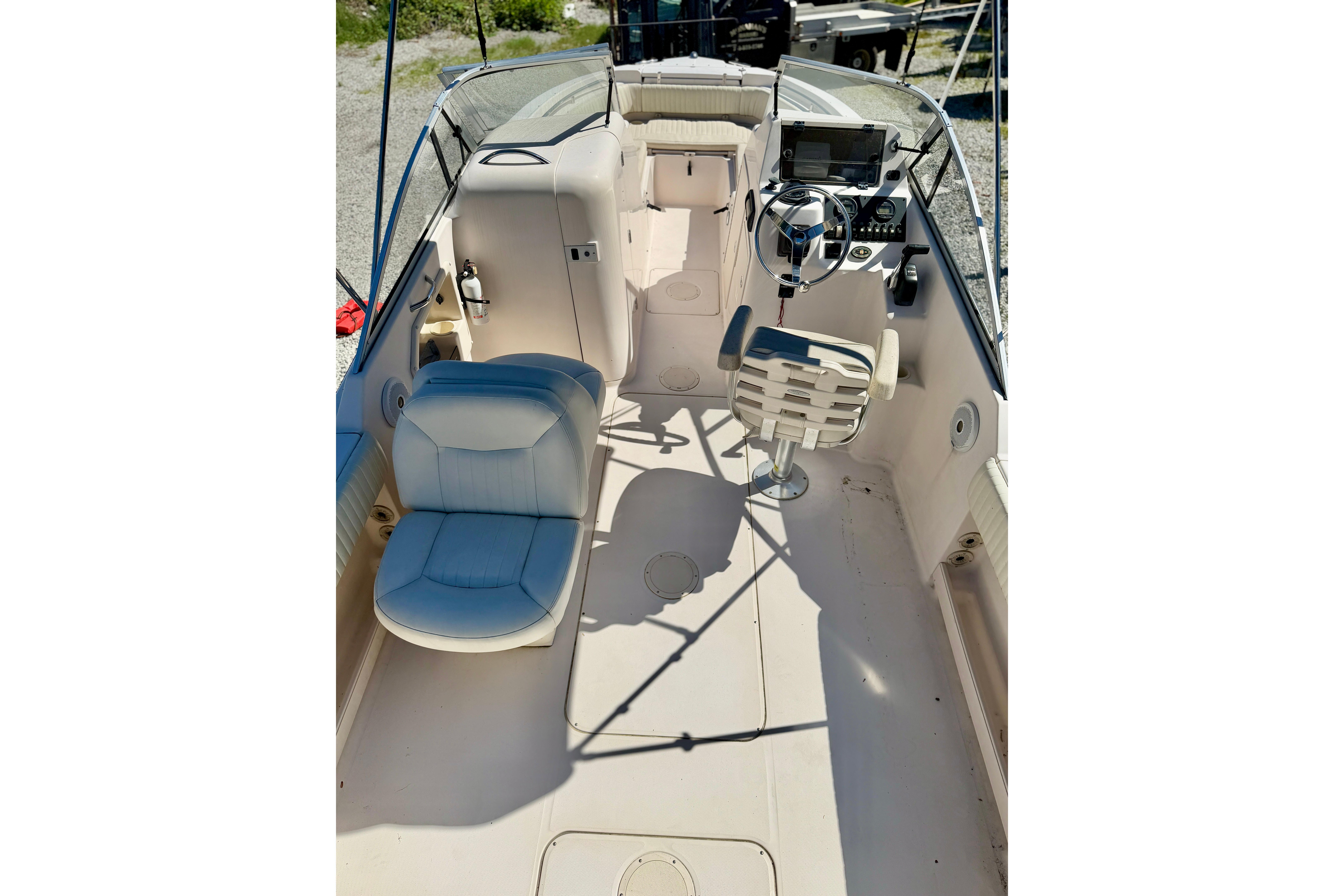 2005 Grady-White Freedom 225 boat interior with seating and steering console.