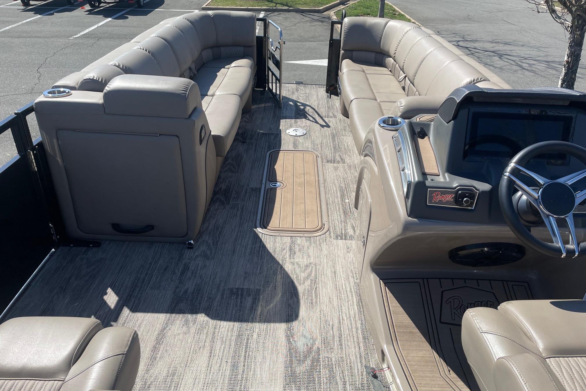 2024 Ranger 2500LS pontoon boat interior with plush seating and modern dashboard.