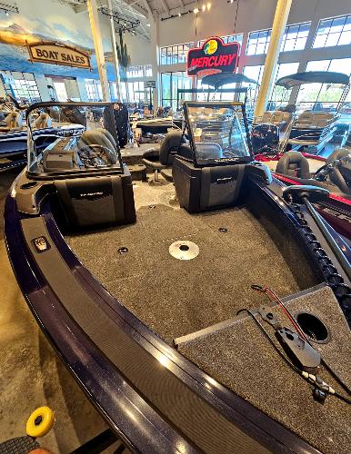 2023 Tracker Targa V-18 WT boat on display at a dealership.