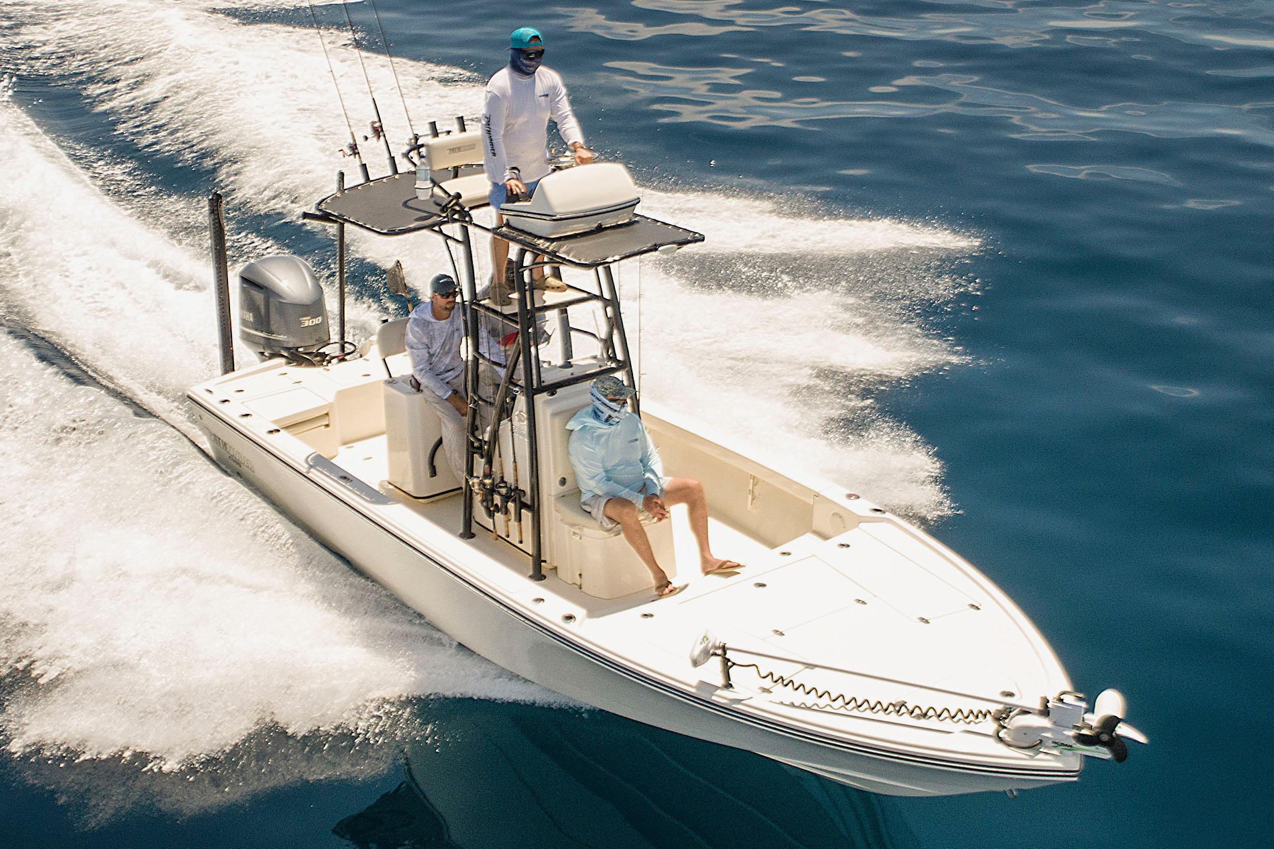 Manufacturer Provided Image: 2024 Pathfinder 2500 Hybrid boat cruising on clear blue water.