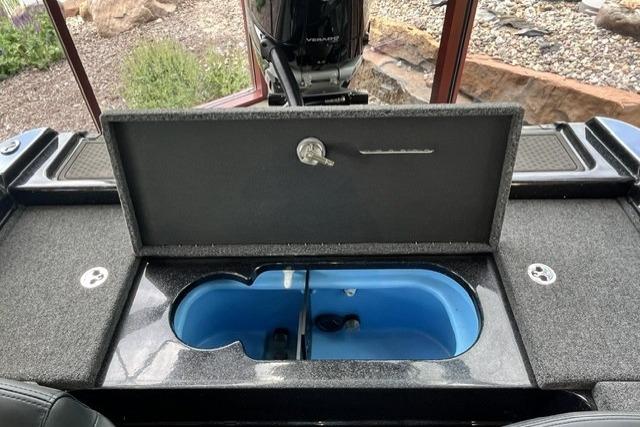 2025 Nitro ZV21 Pro boat livewell with open lid, showcasing interior compartments.