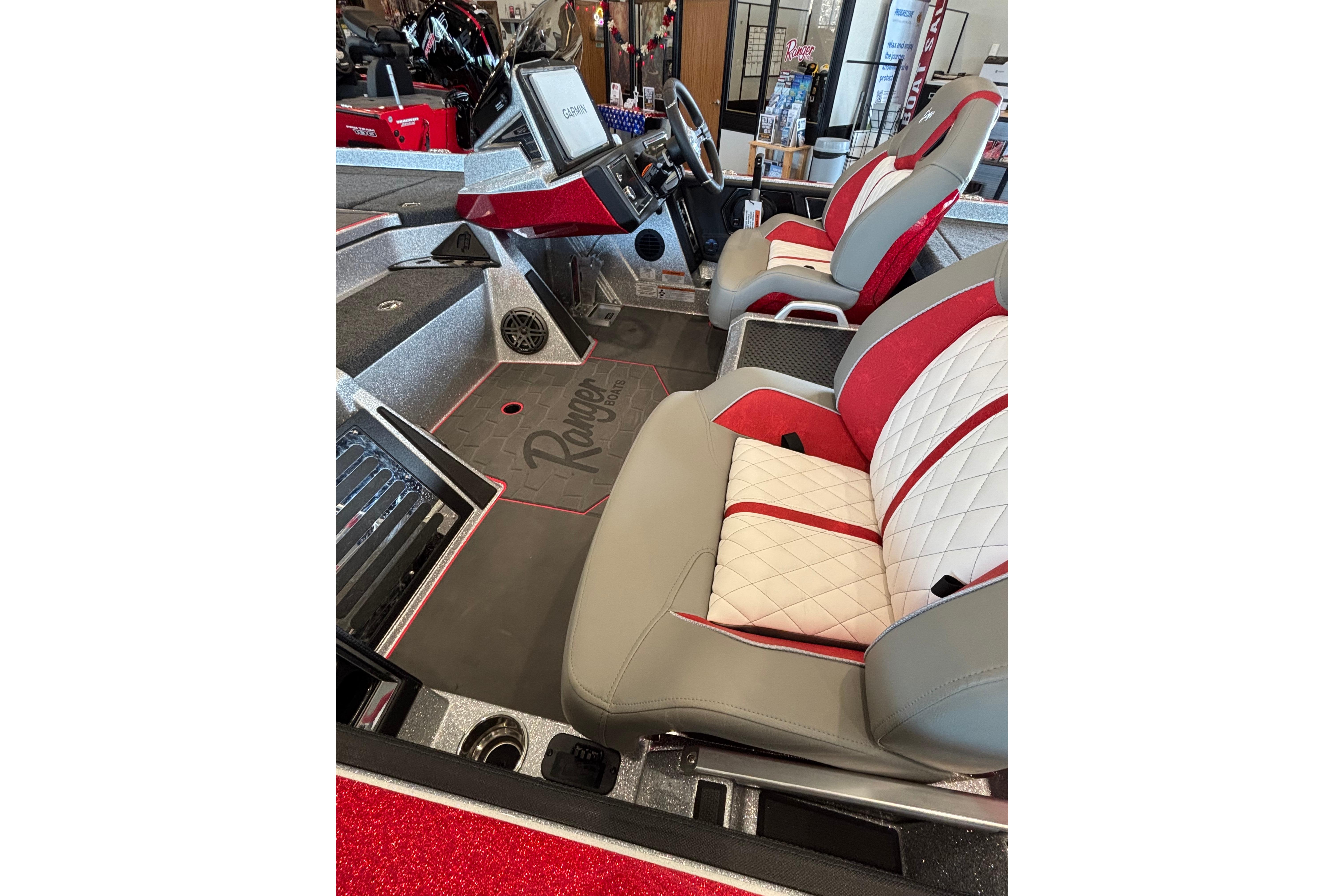 2026 Ranger Z520R Cup-Equipped boat interior with red and white seating, advanced dashboard.