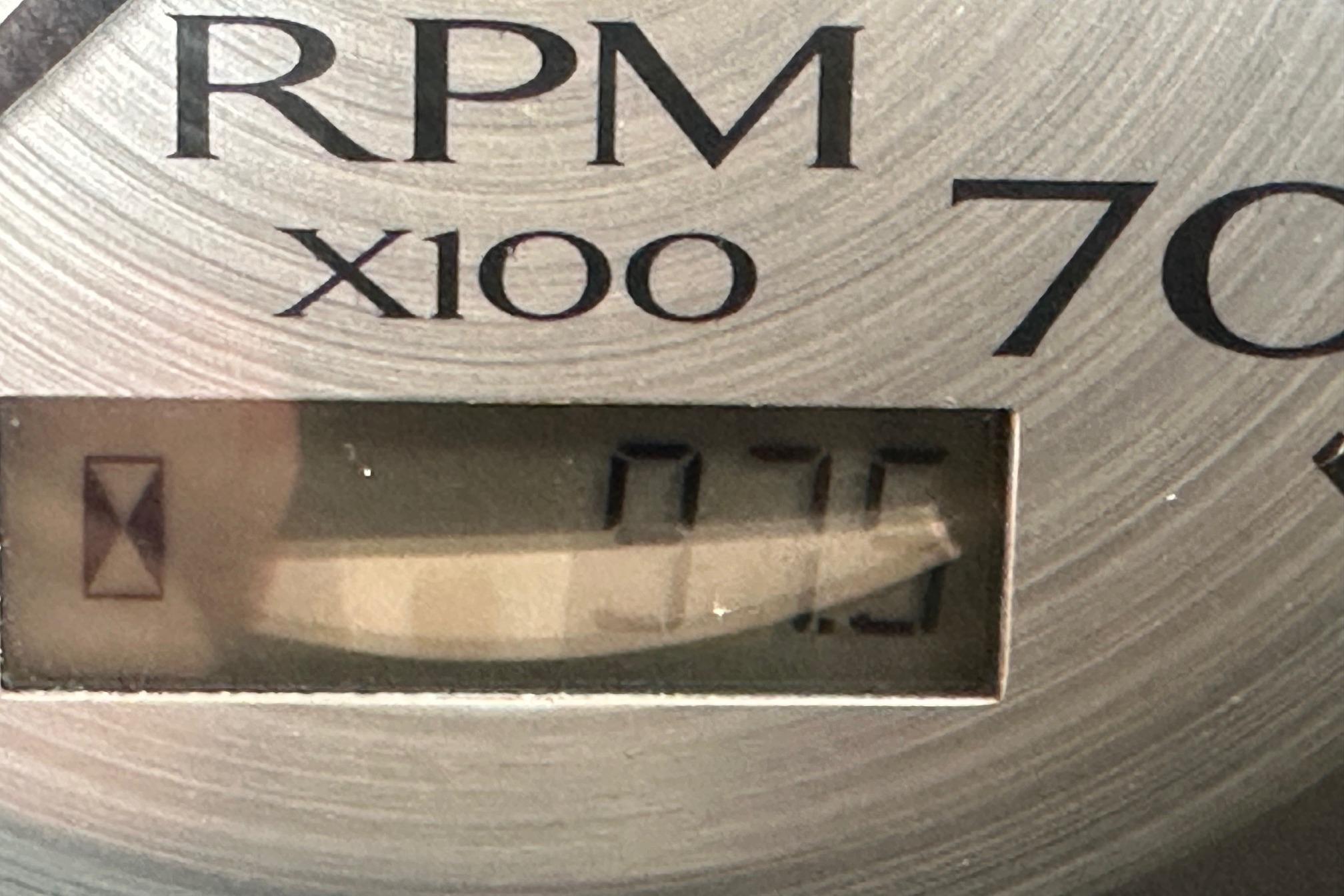 Close-up of RPM gauge reading 750 on a 2016 Bennington 24 SCWX.