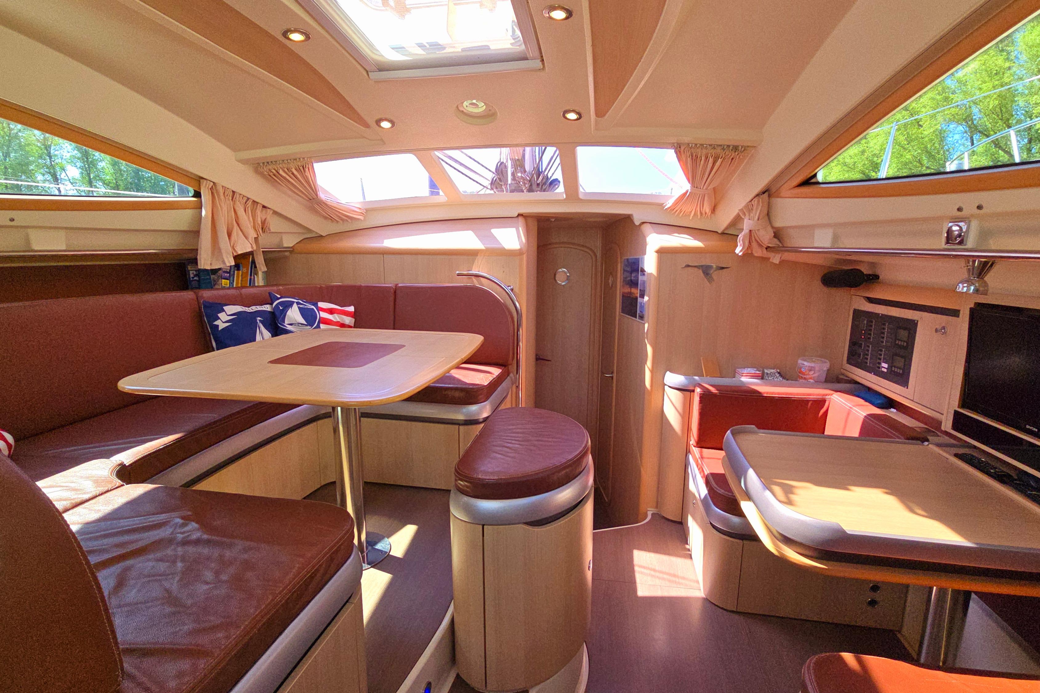 Luxurious interior of a 2007 Etap 46 DS yacht with elegant wood finishes.