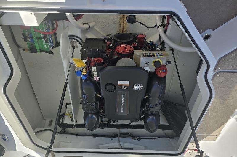 Engine compartment of a 2022 Cobalt R4 boat, featuring a Volvo Penta engine.