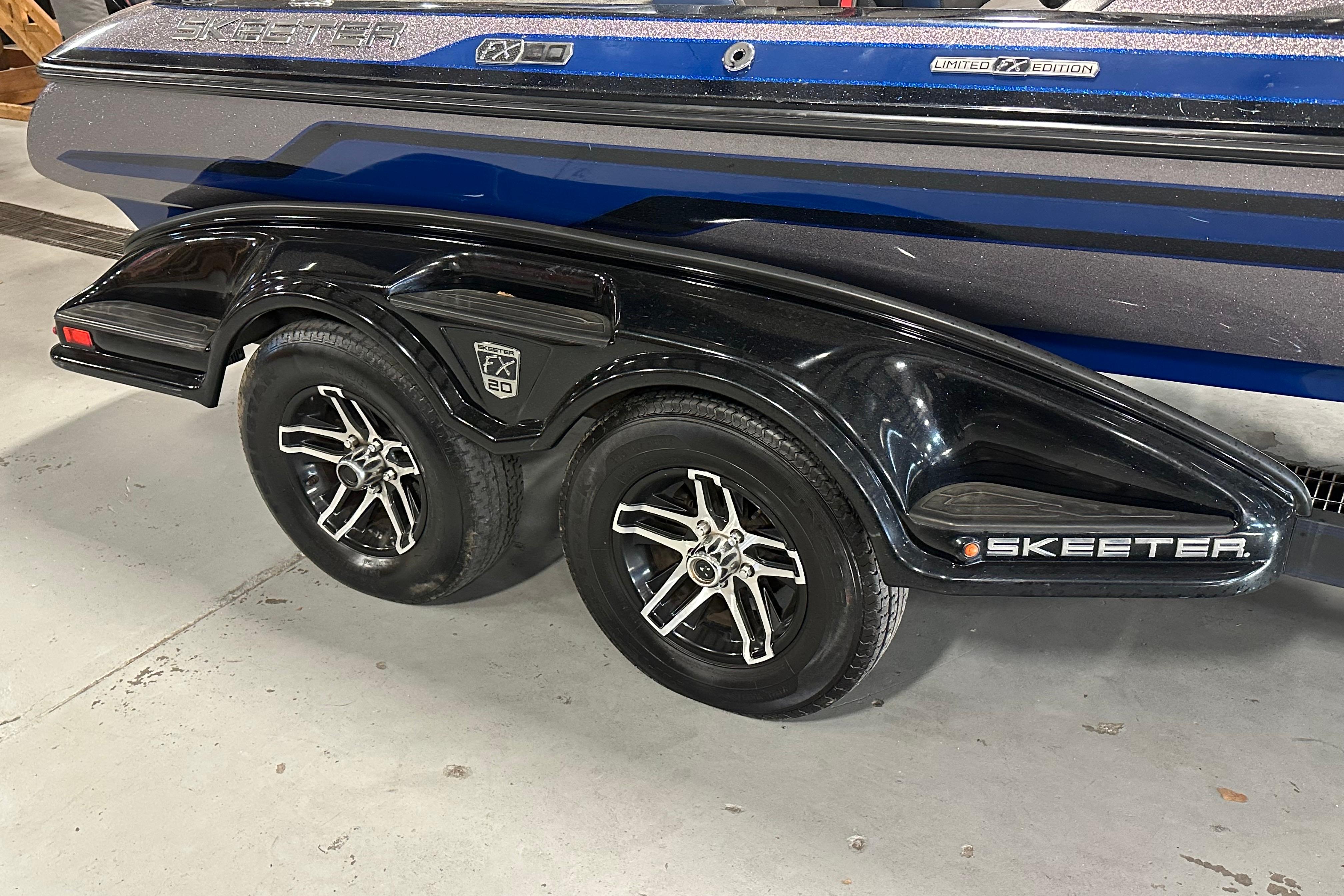 2016 Skeeter FX20 Limited Edition boat trailer with dual wheels and sleek design.