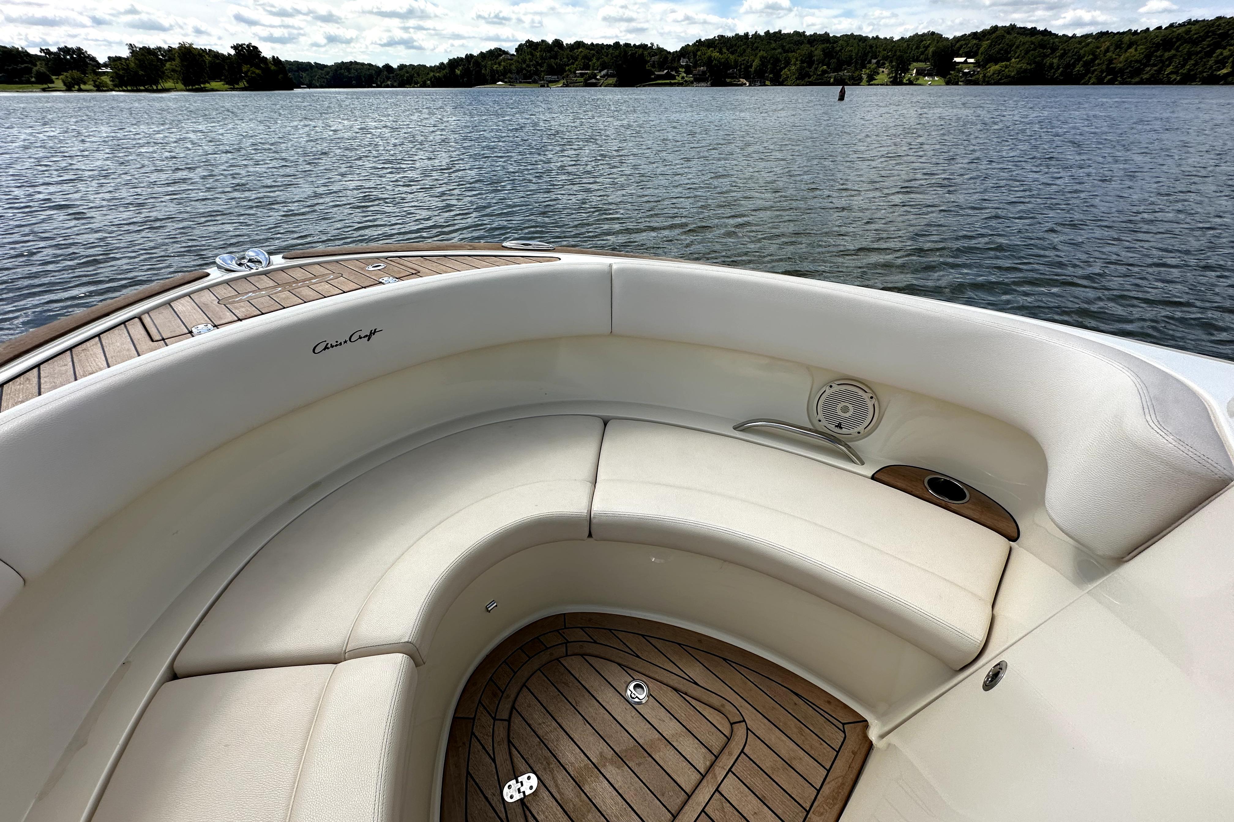 2019 Chris-Craft Launch 30 boat interior with elegant seating and scenic lake view.