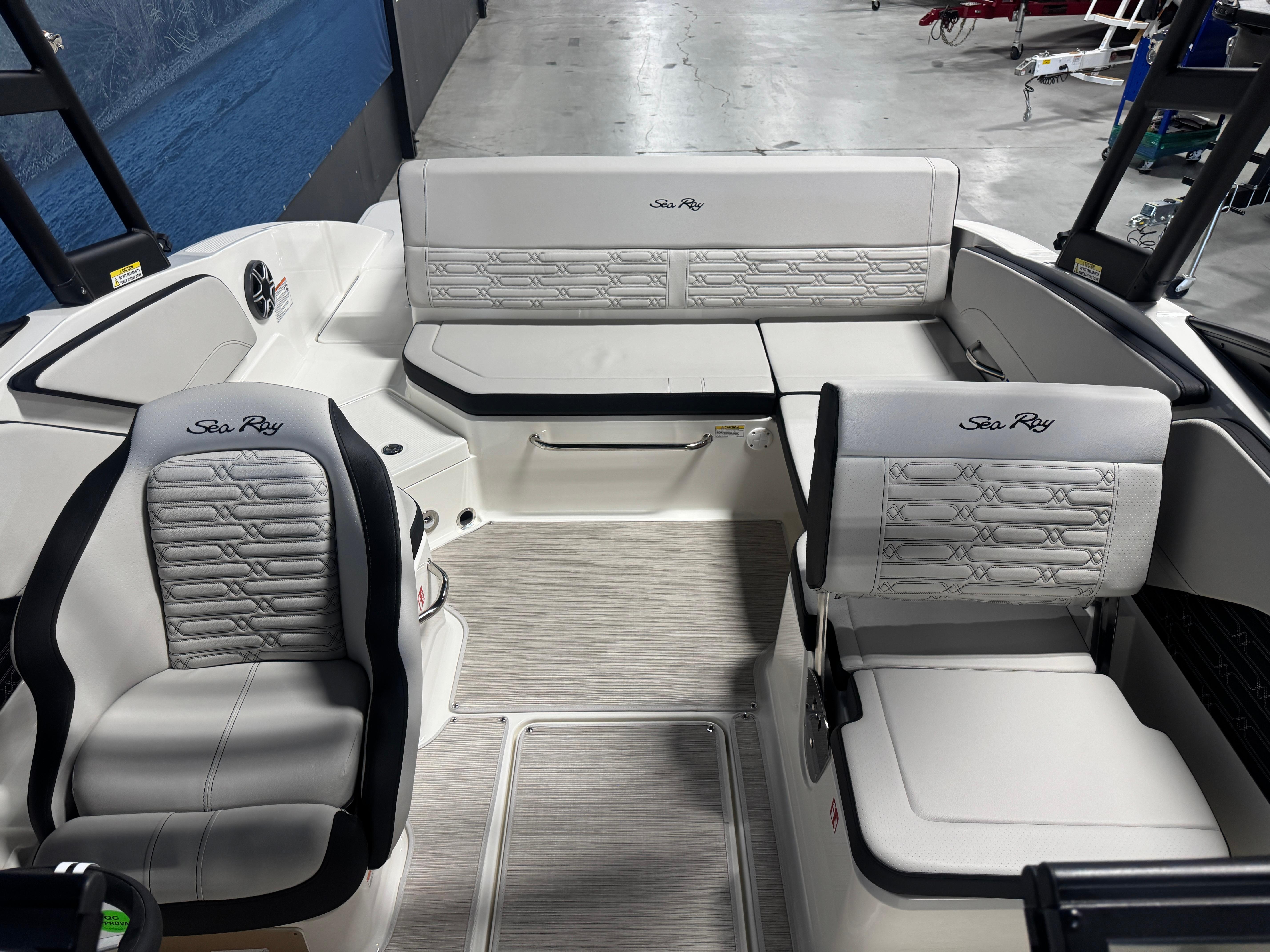 2026 Sea Ray SPX 210 boat interior with luxurious seating and modern design.
