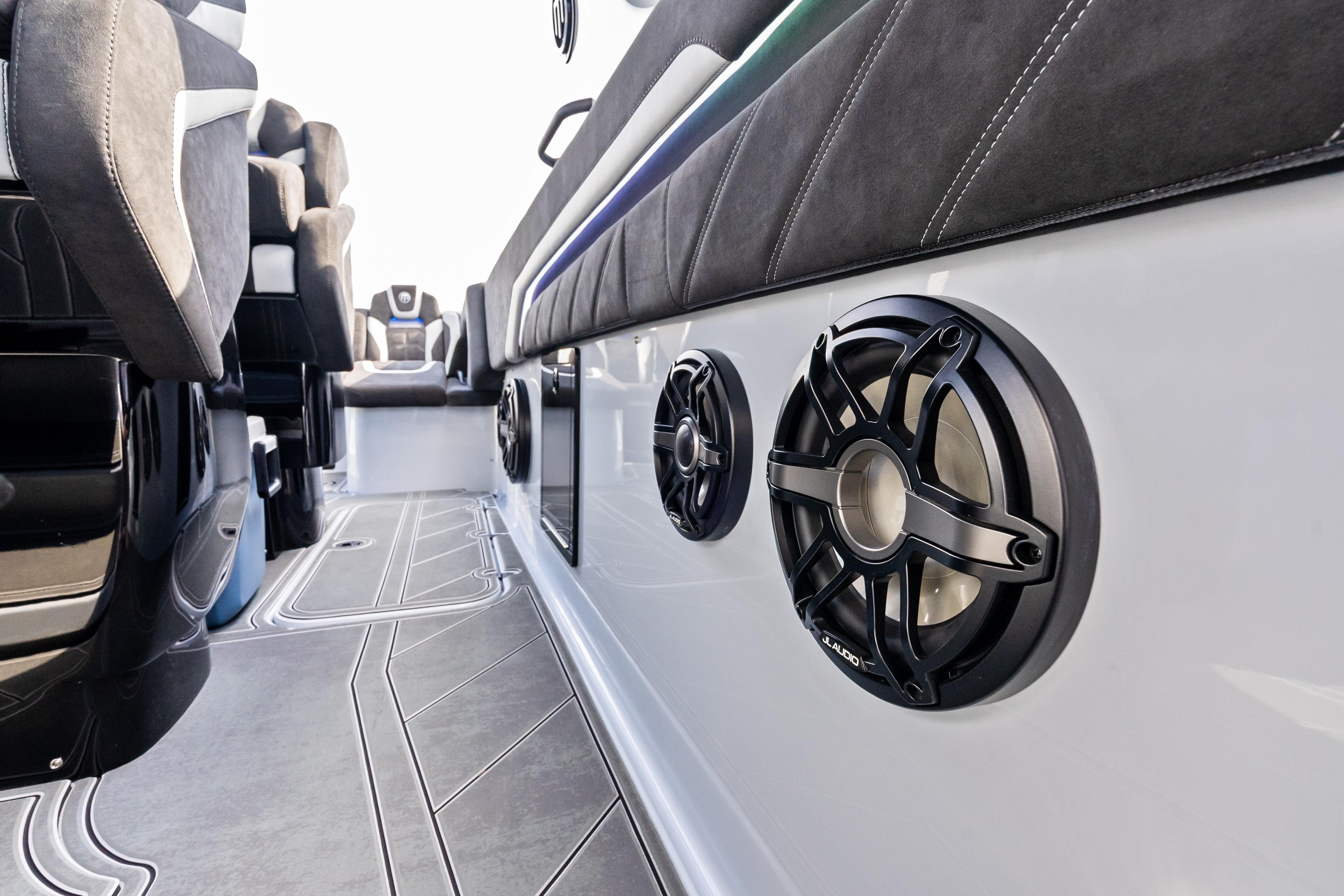 Interior view of 2027 Mystic Powerboats M4200 featuring sleek seating and premium audio system.
