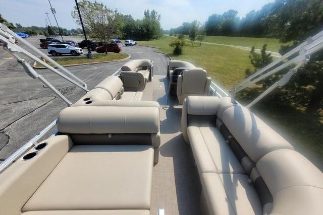 2025 Sun Tracker Party Barge 22 RF XP3 with spacious seating and scenic outdoor view.