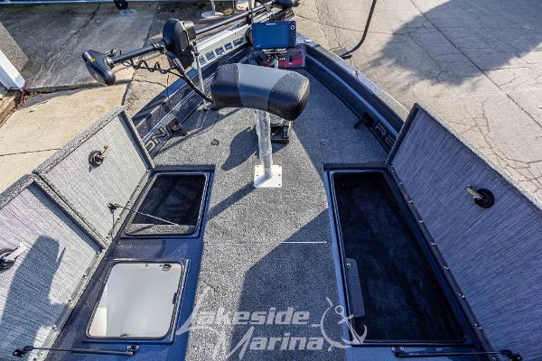 2024 Recon 985 SC fishing boat interior with storage compartments and seating at Lakeside Marina.