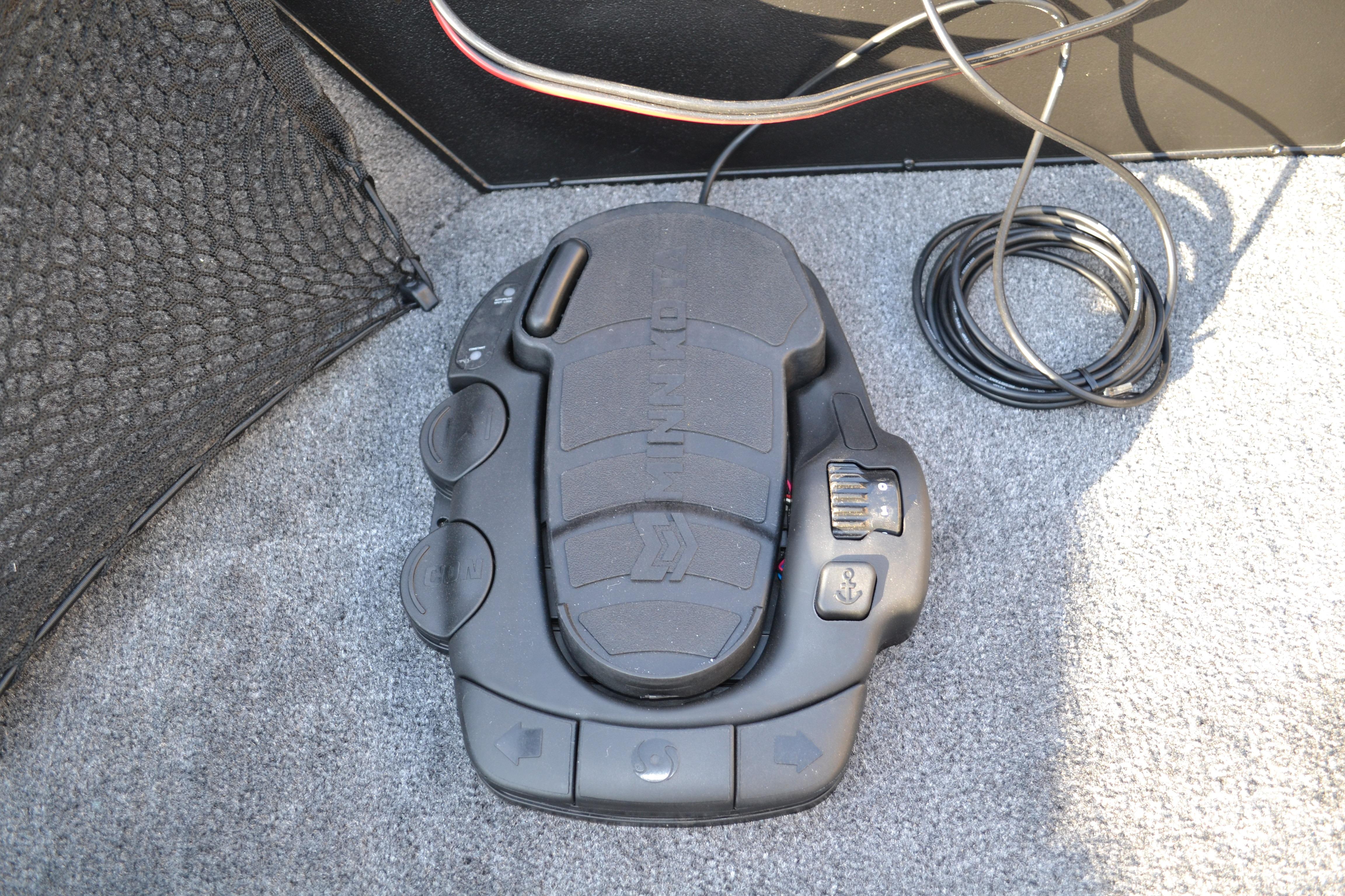 Foot pedal control in 2026 Ranger VS1882SC Reata boat, on carpeted floor with cables.
