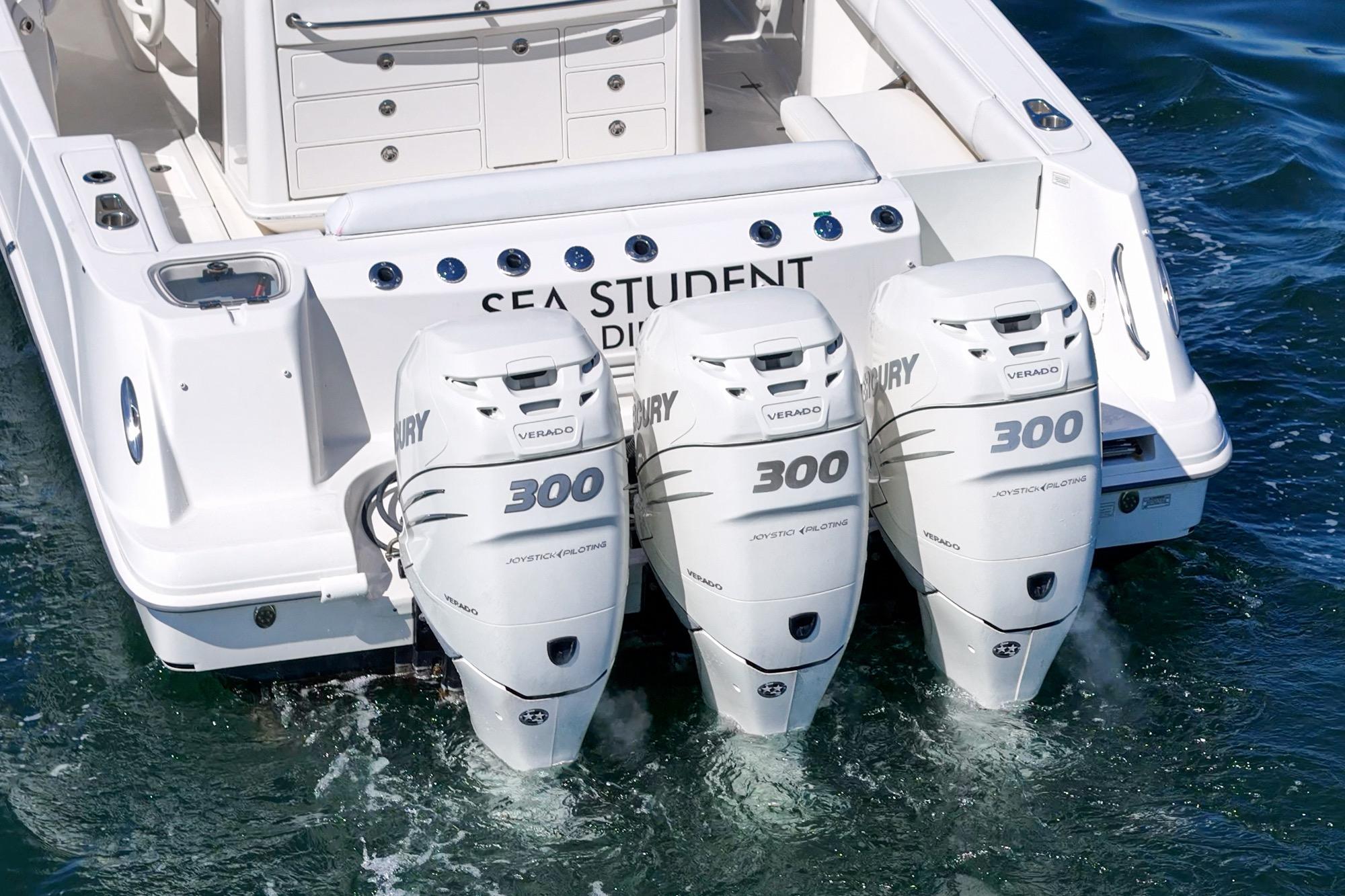 2015 Boston Whaler 370 Outrage with triple Mercury 300 engines on water.