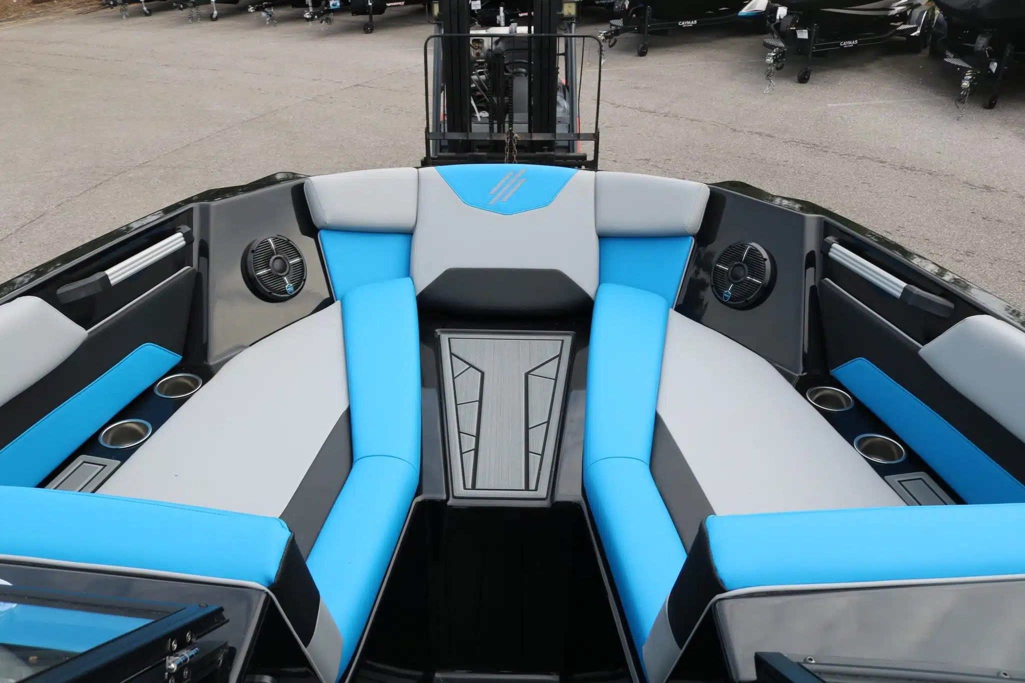 Interior of 2024 ATX Surf Boats 24 Type-S with blue seating.