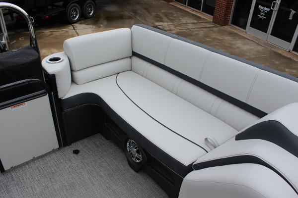 2025 Tahoe Pontoon Cascade Quad Lounger interior with plush seating and cup holder.