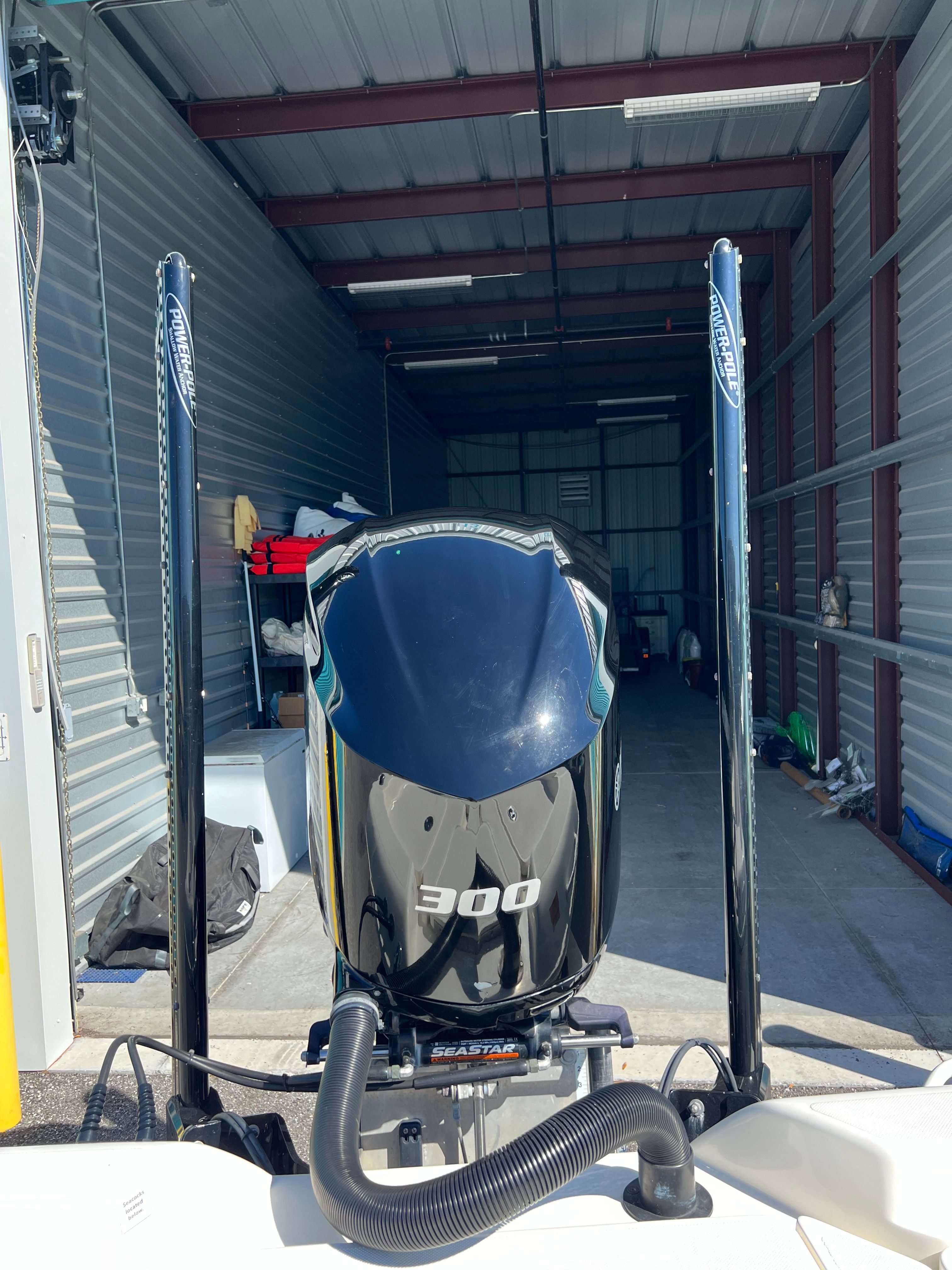 A 2020 Skeeter SX240 with a 300 HP engine in a storage facility.