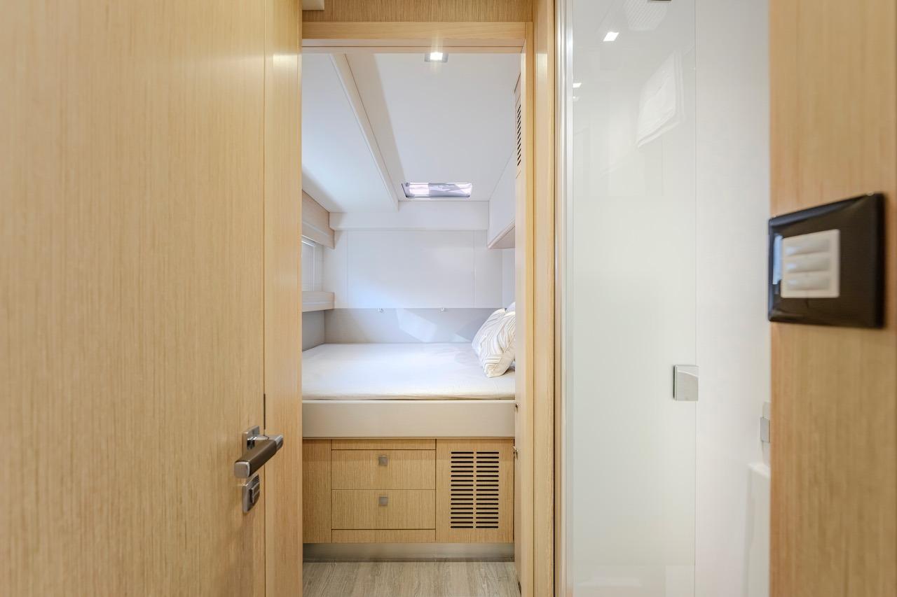 Interior of Privilege Signature 510 yacht, modern bedroom design, year 2025.